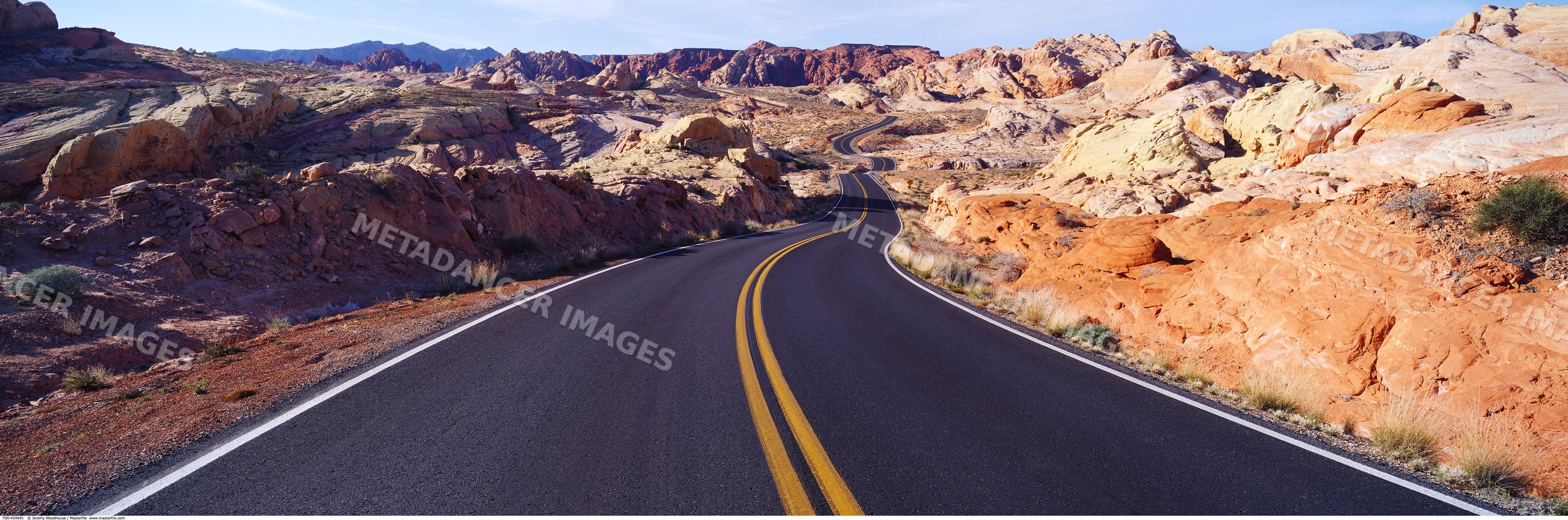 Road winding through desert rock formations