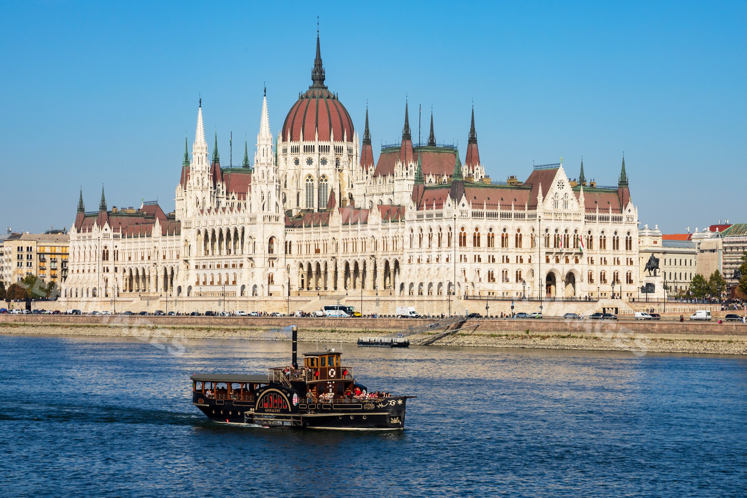 Hungarian Houses of Parliament and steam powered paddle wheel boat