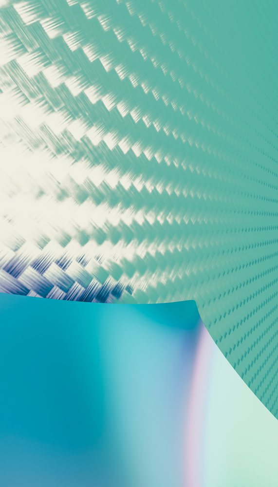 Close-up of a decorative textured wall with blue gradient and smooth