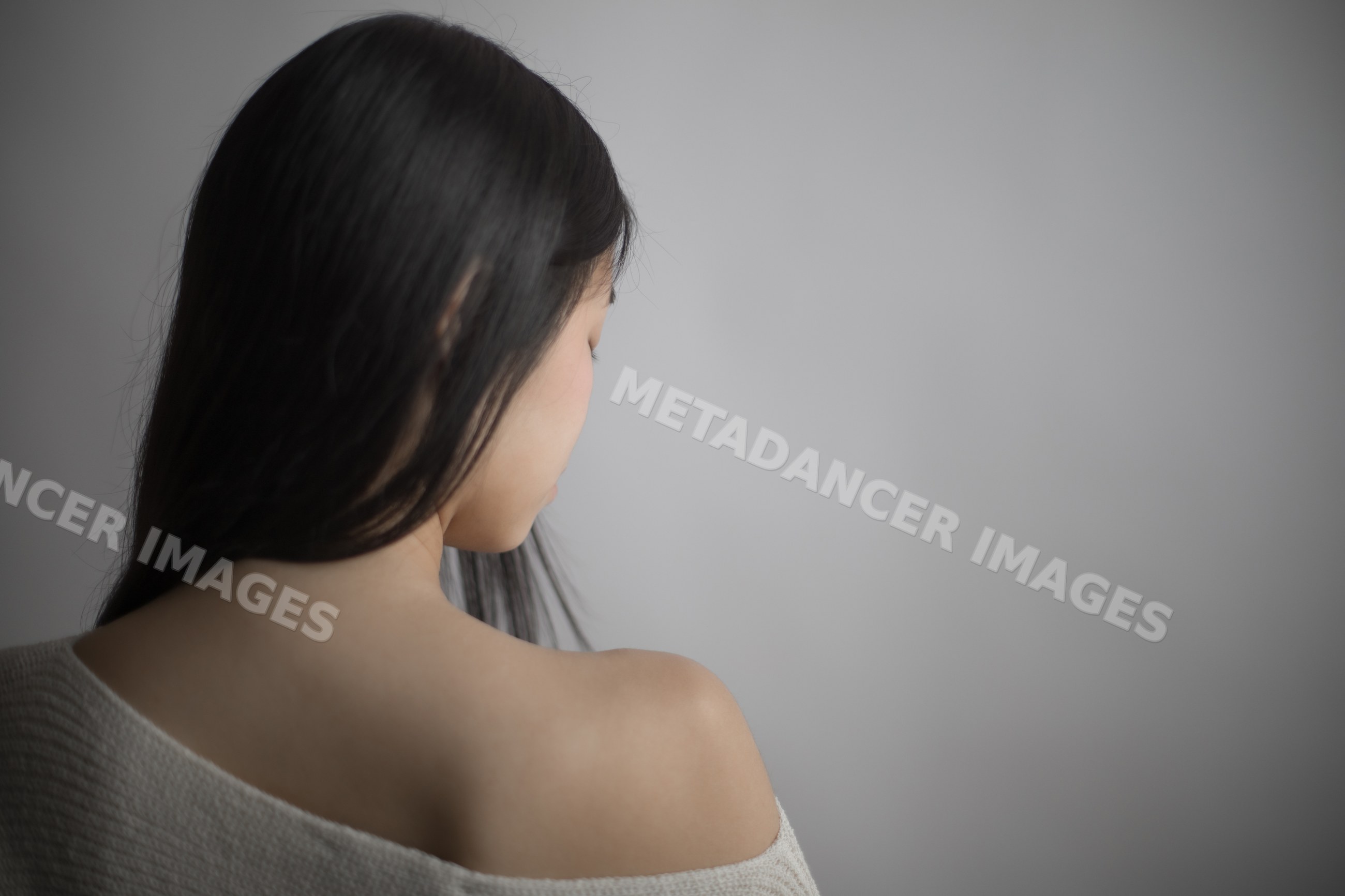 Southeast Asian woman with long black hair