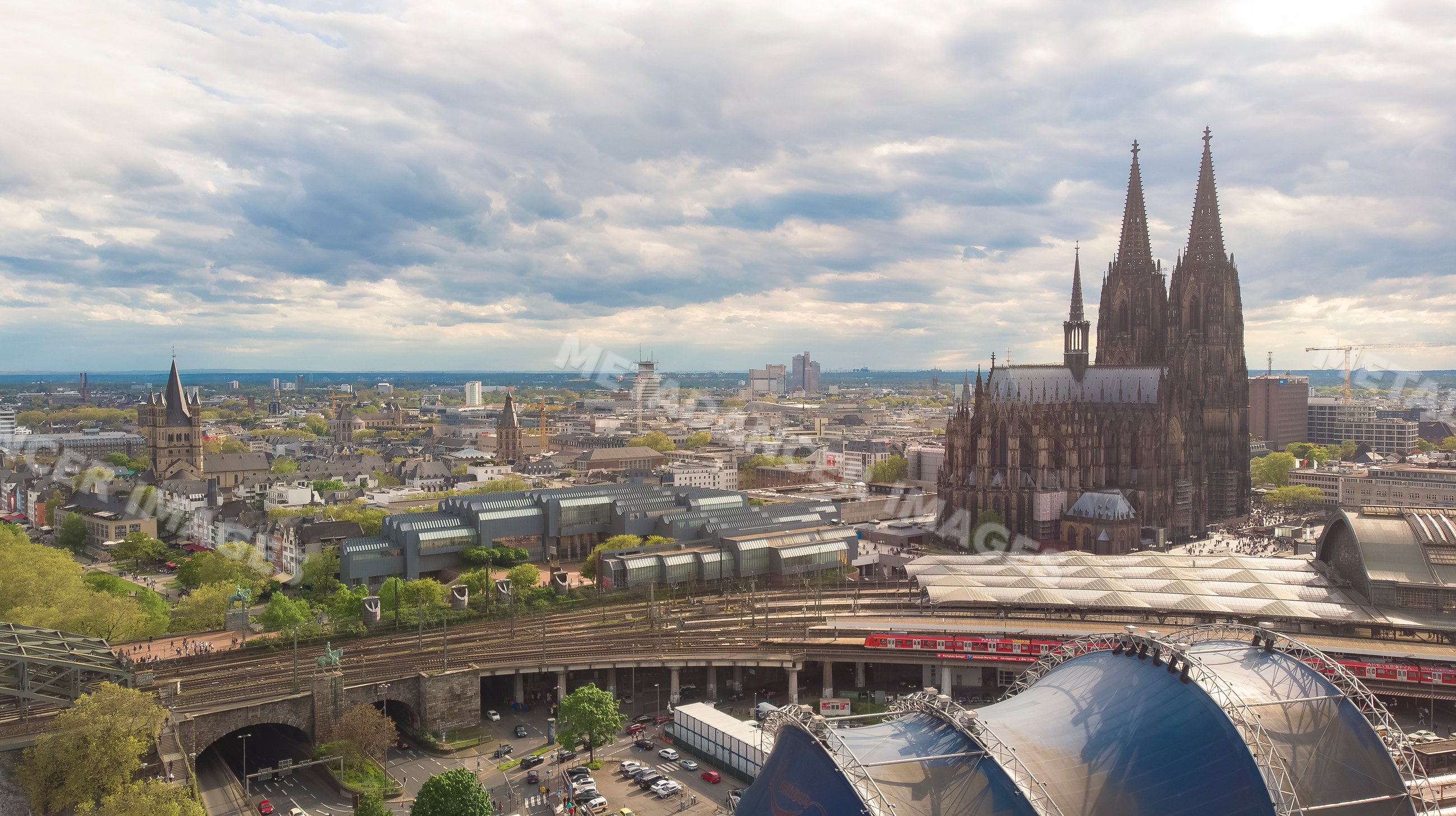 Aerial view of the gothic cathedral and railway station in Cologne