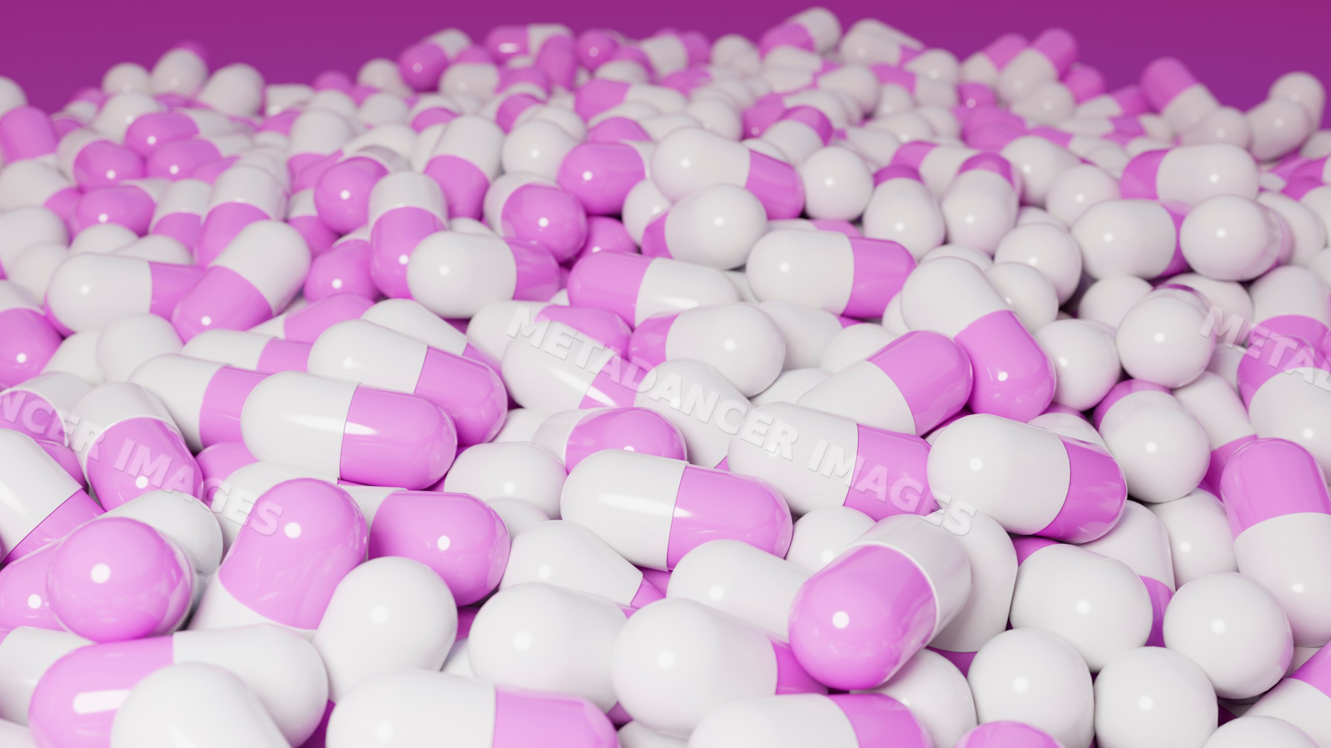 Close-up of a pile of glossy purple and white capsules