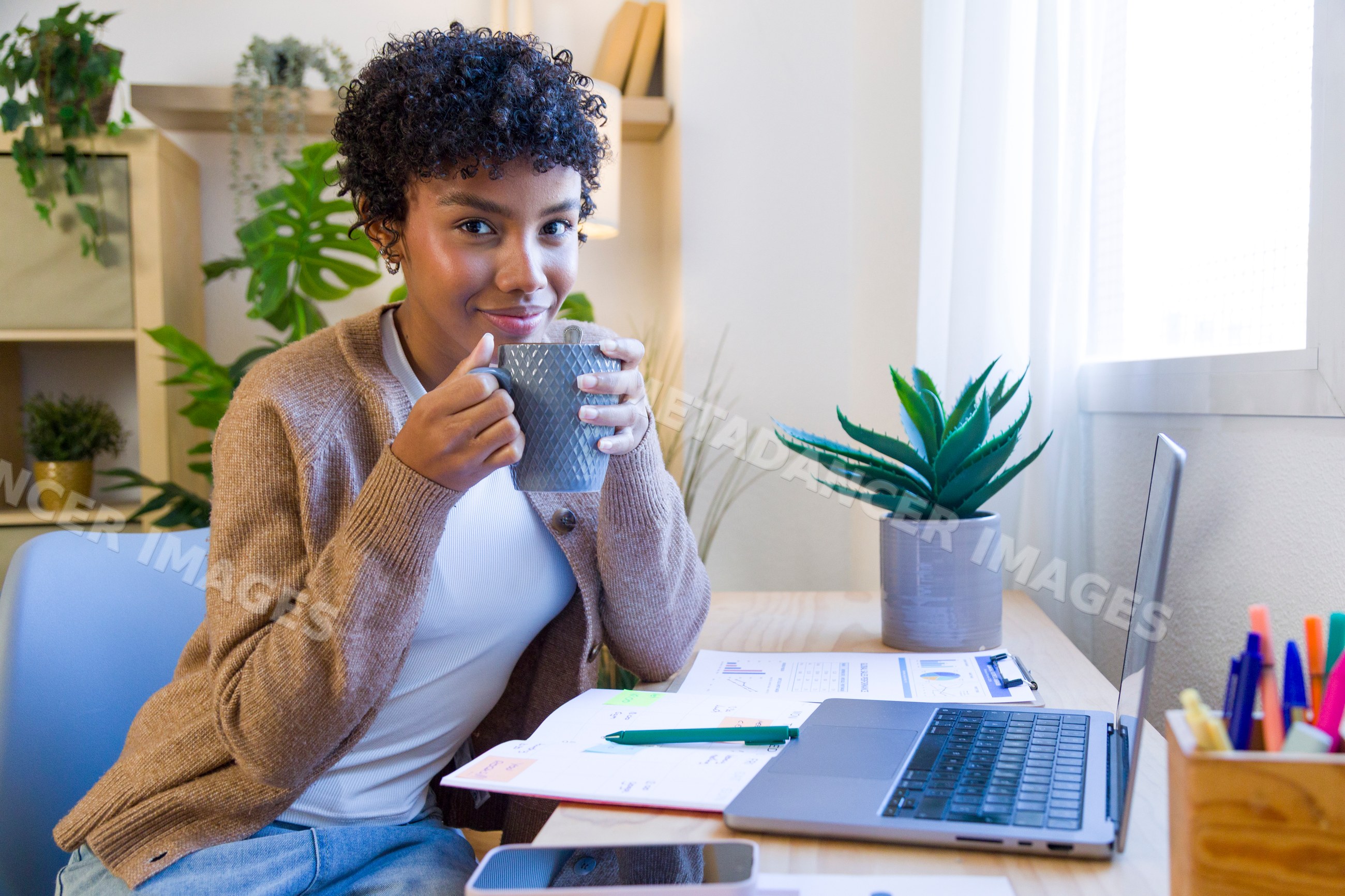 African American woman drinking coffee