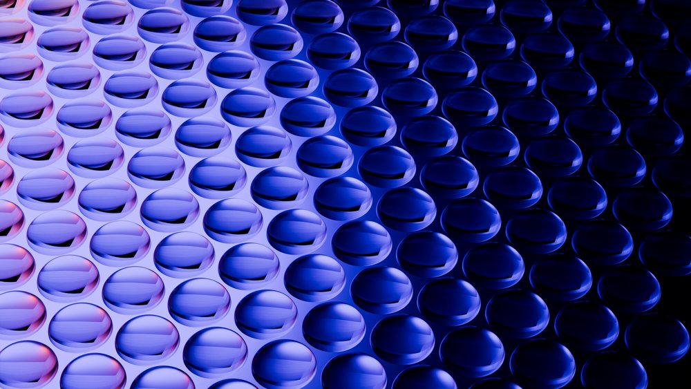Blue spheres arranged in a geometric repeating pattern illustration
