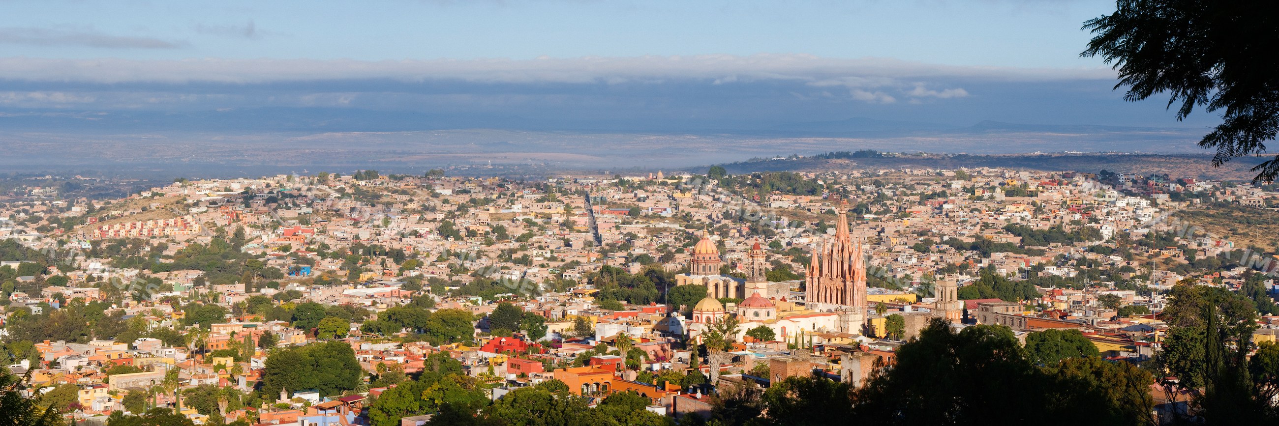 Panoramic cityscape of san miguel de allende with historic churches