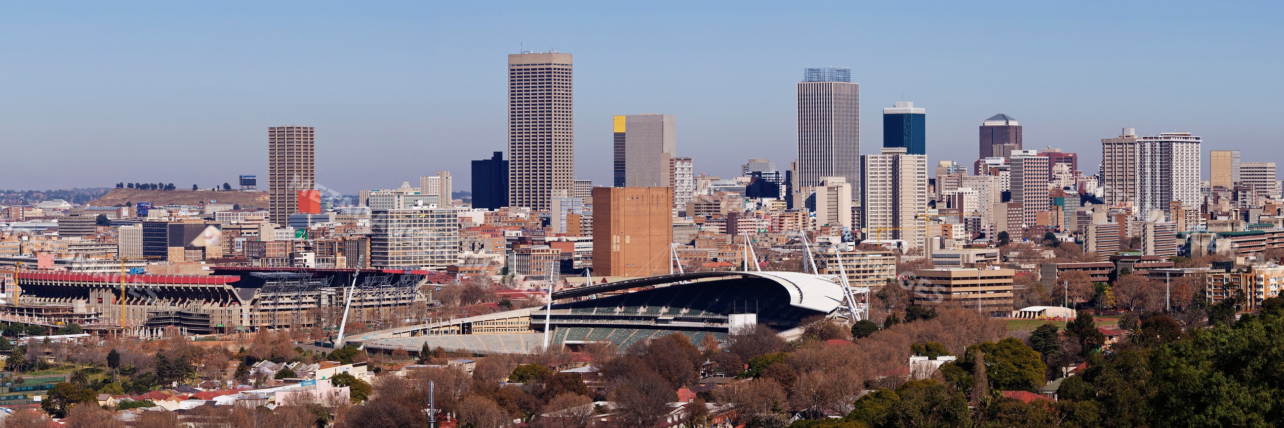 City skyline with stadium in johannesburg, gauteng province