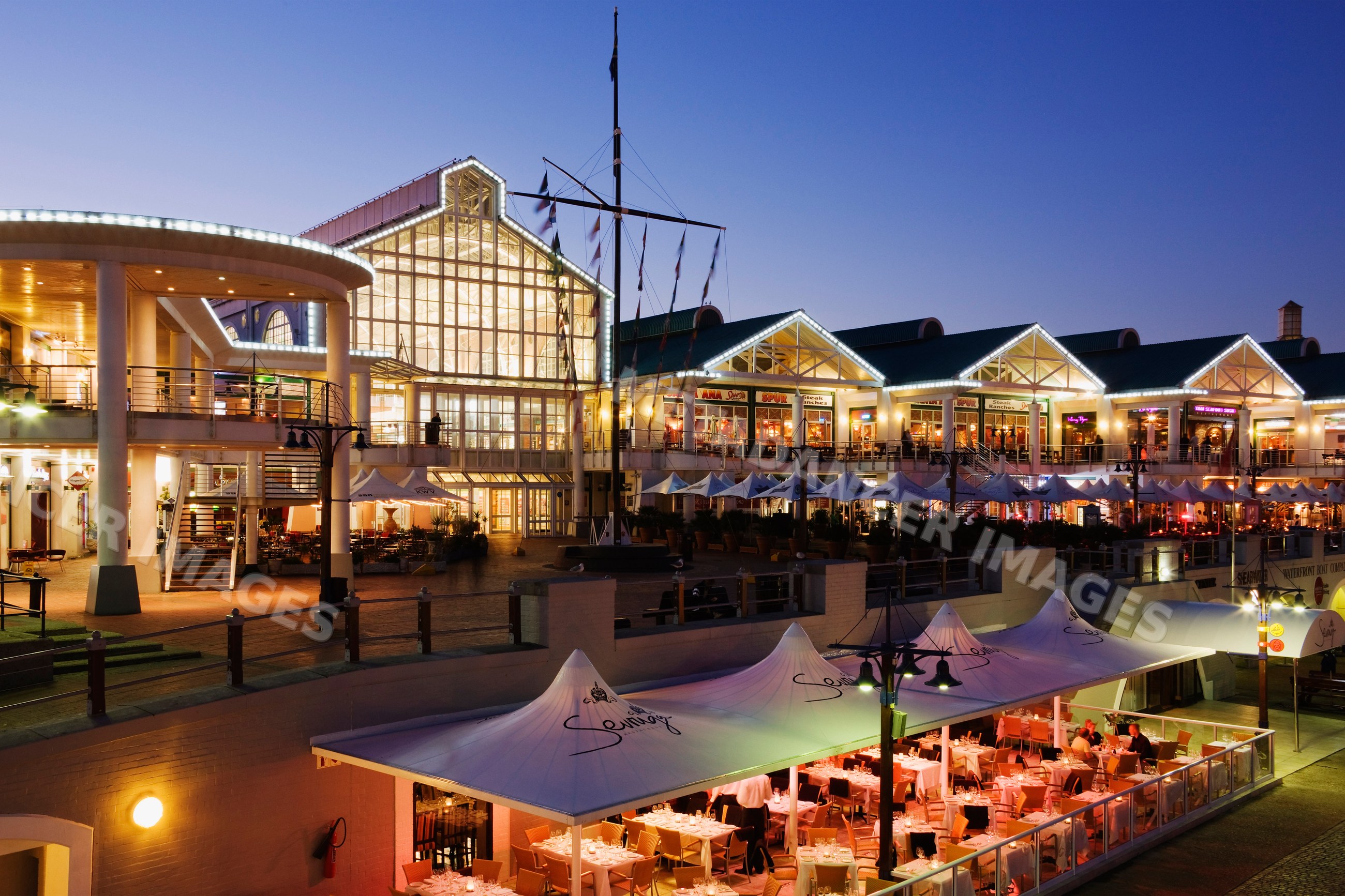 Victoria & albert waterfront dining area at twilight south africa