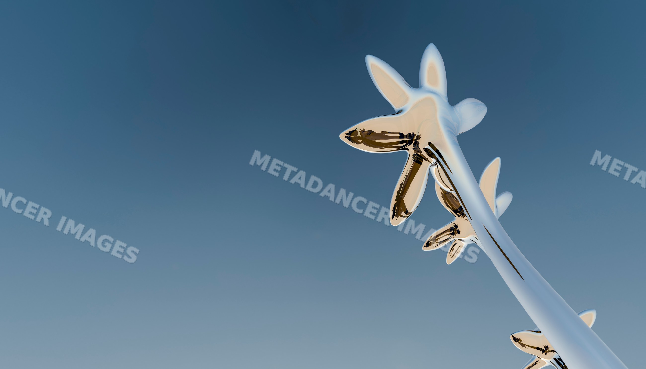 Abstract shiny metal sculptures stand tall against a clear blue sky