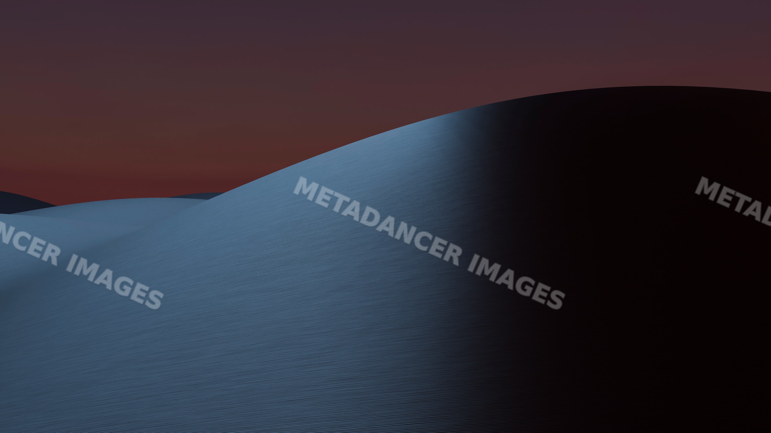 Sand dunes under a sunset sky in desert landscape