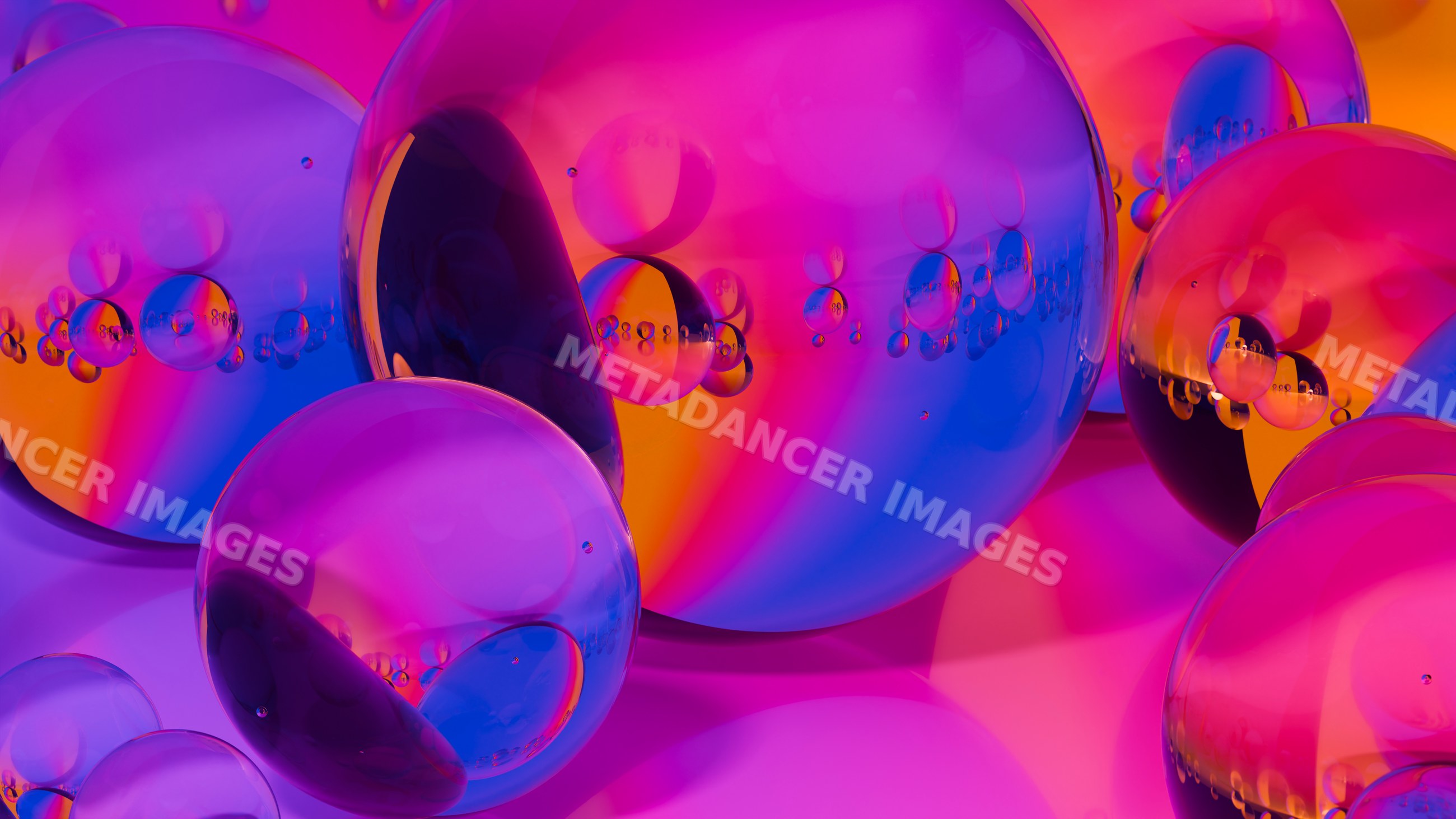 Colorful transparent bubbles clustered on vibrant gradient background