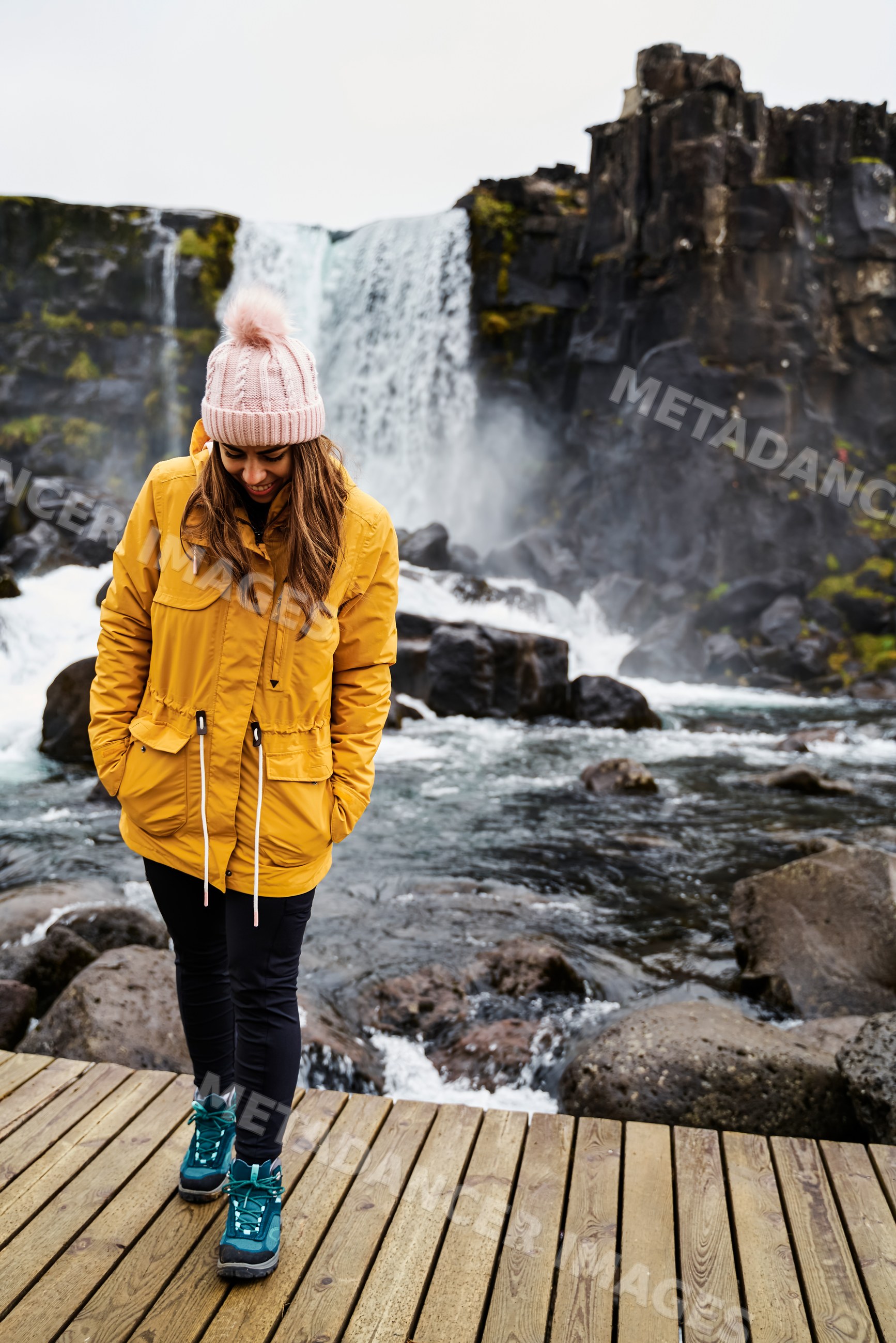 A white woman enjoys hiking