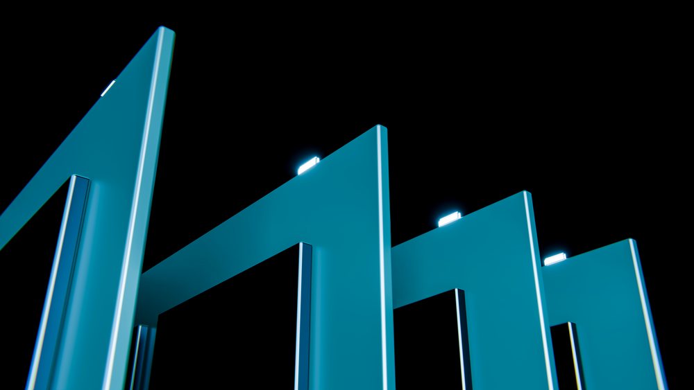 Blue glowing abstract geometric 3d shapes on dark background