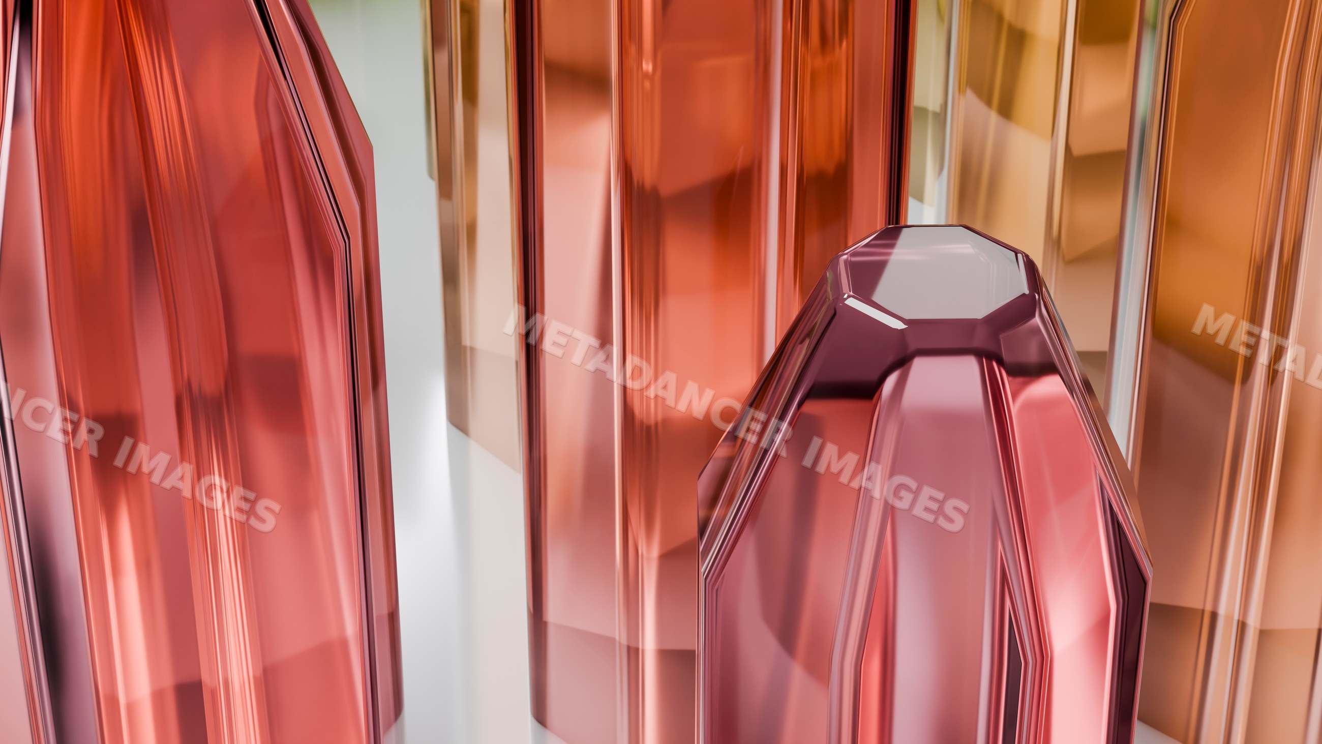 Abstract modern glass sculptures with reflective orange and red tones