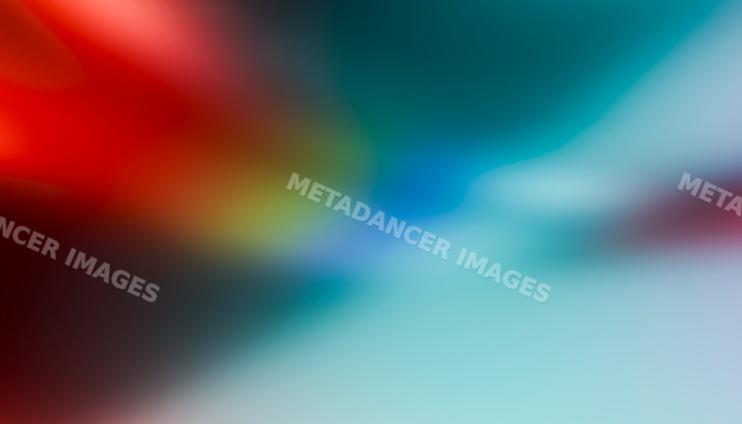 Abstract blurred colorful background with vibrant red, blue, and green