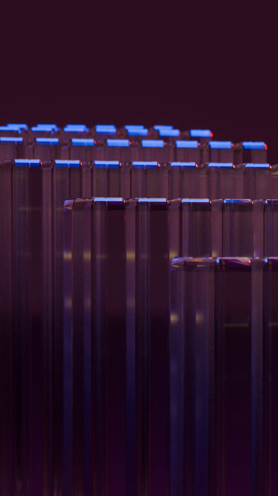 Transparent glass pillars illuminated by blue and purple lighting