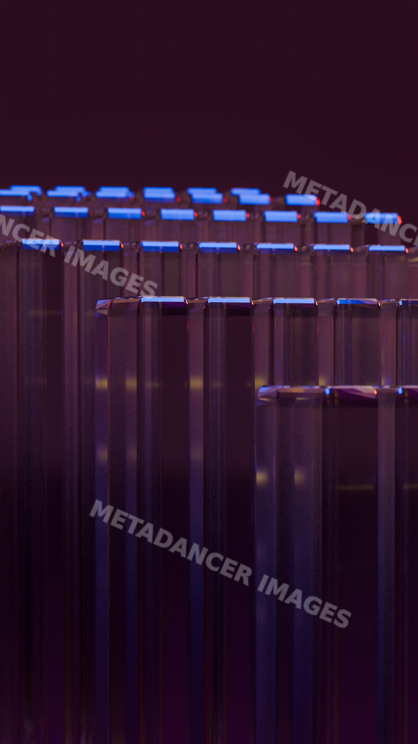 Transparent glass pillars illuminated by blue and purple lighting