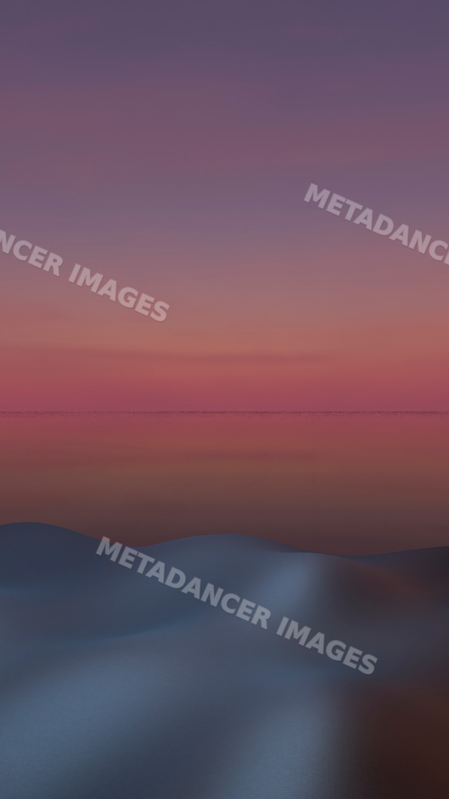 Sunset over peaceful dunes in a tranquil desert landscape
