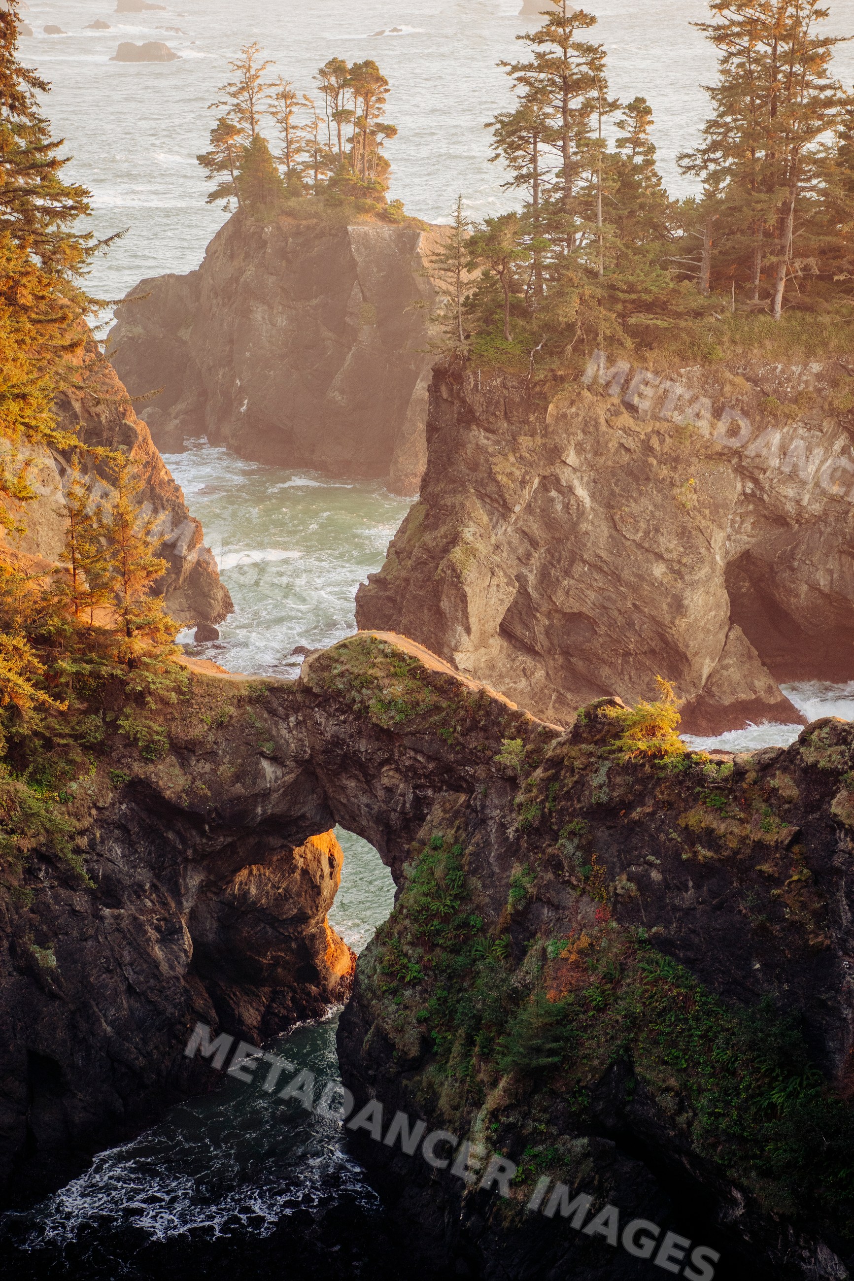 Natural rock arch and sea stacks Oregon coastline