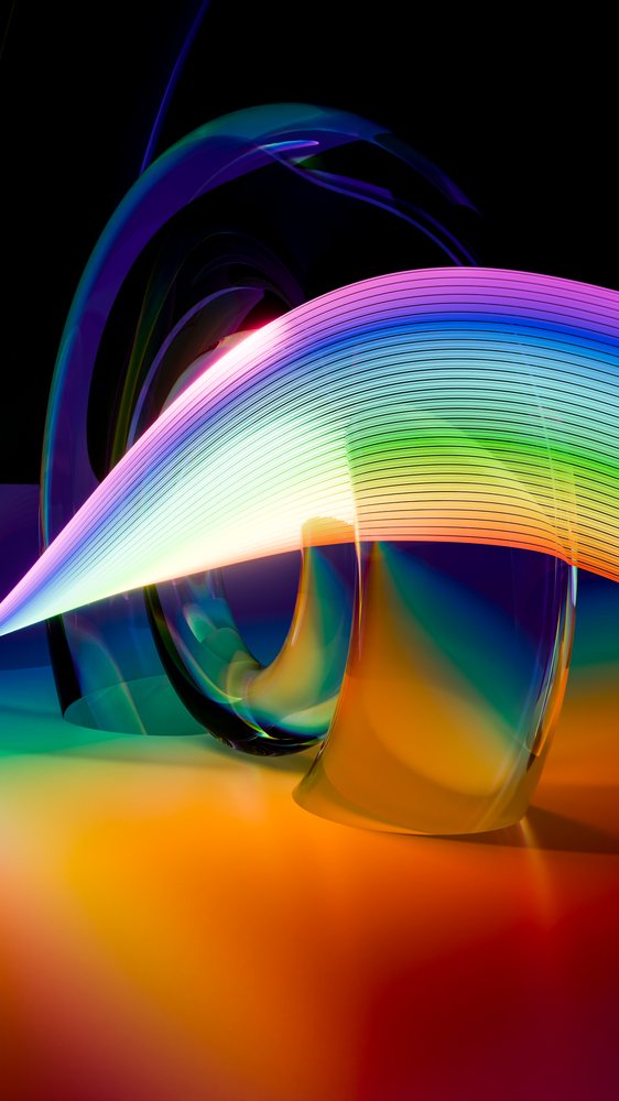 Abstract digital art of colorful flowing light waves and glass-like