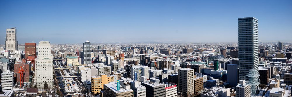 City skyline of sapporo with snowy streets japan