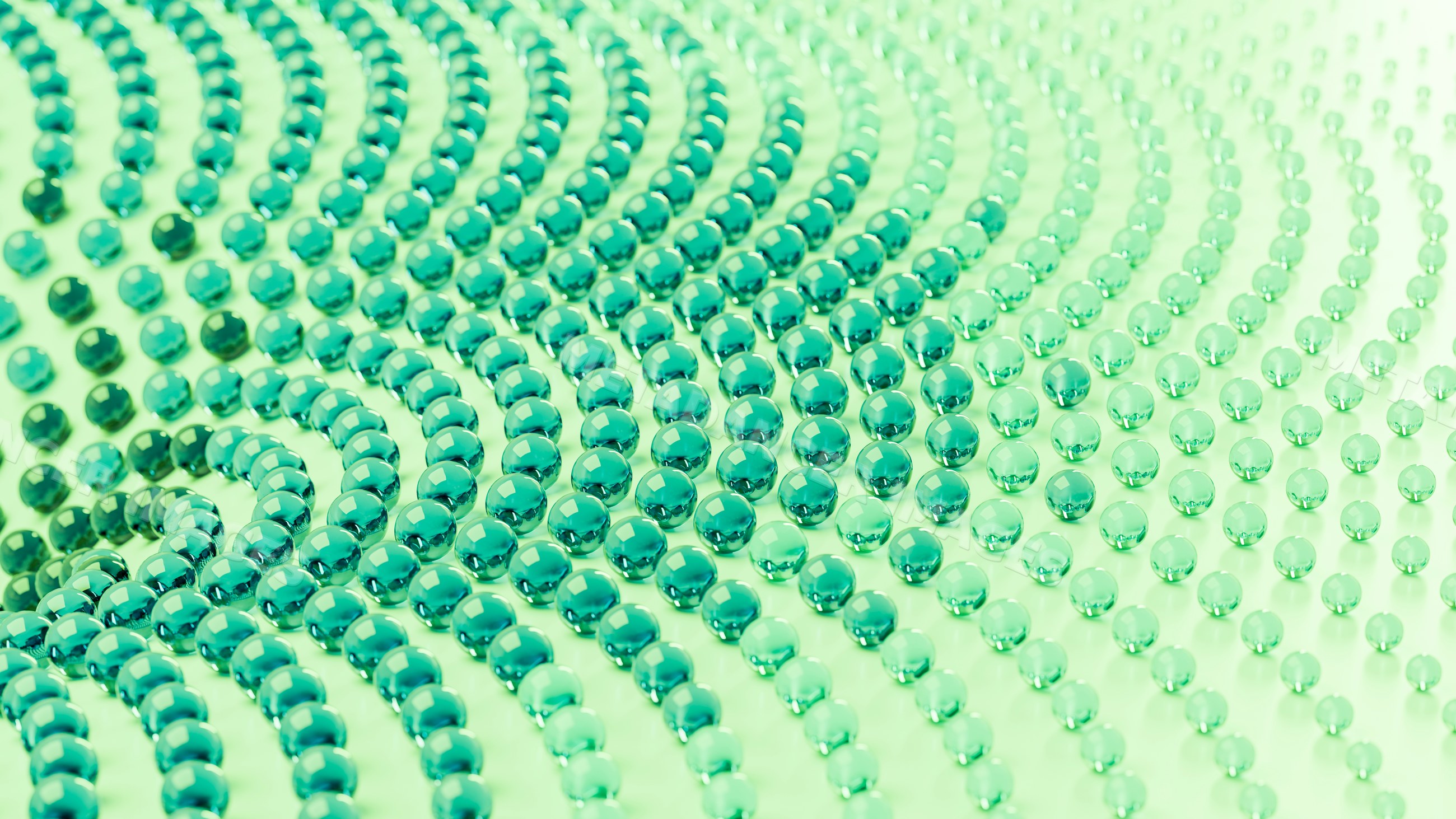 Arrangement of green glass beads forming a decorative pattern