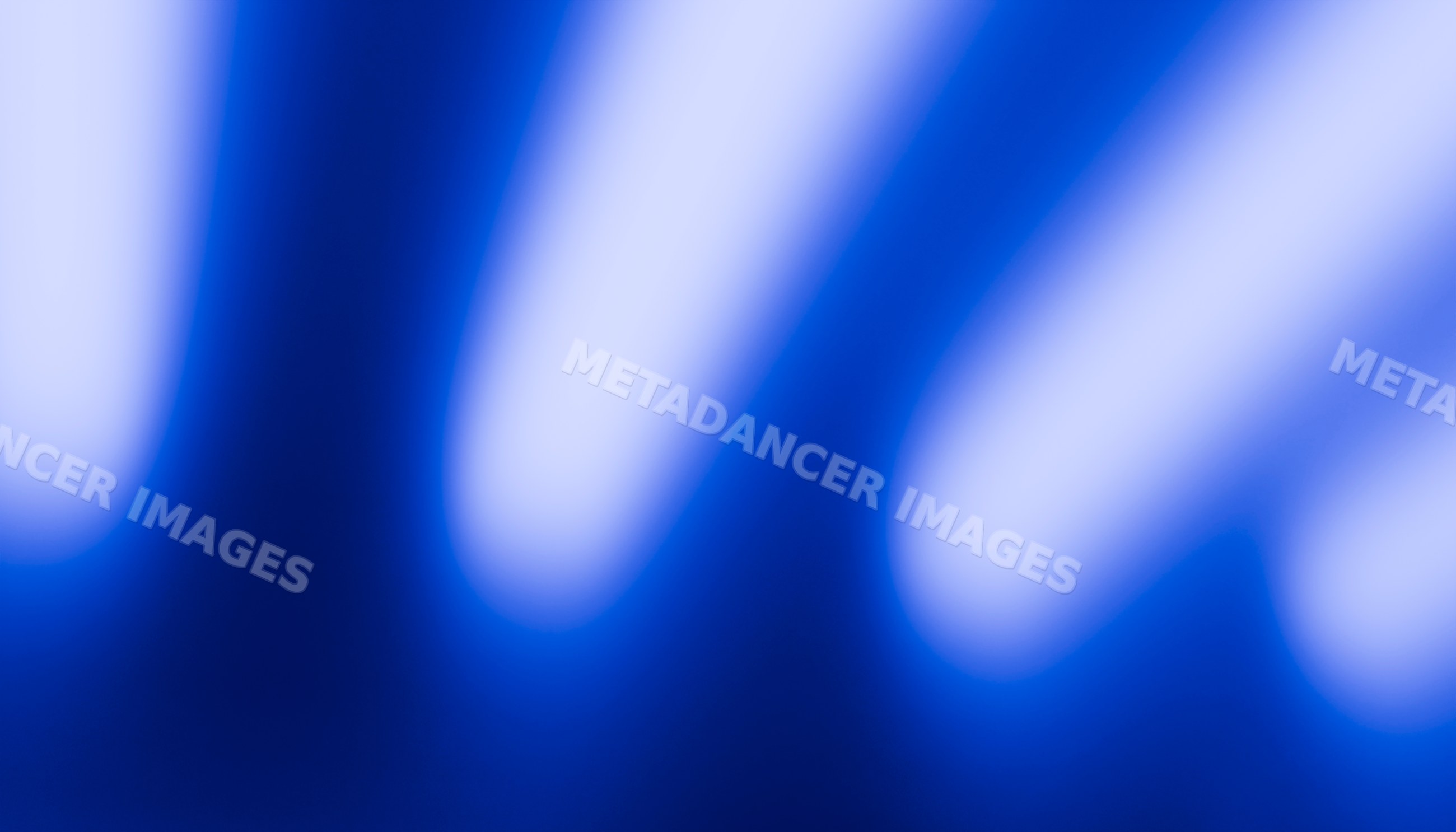 Abstract blue blurred light streaks with soft glowing effect