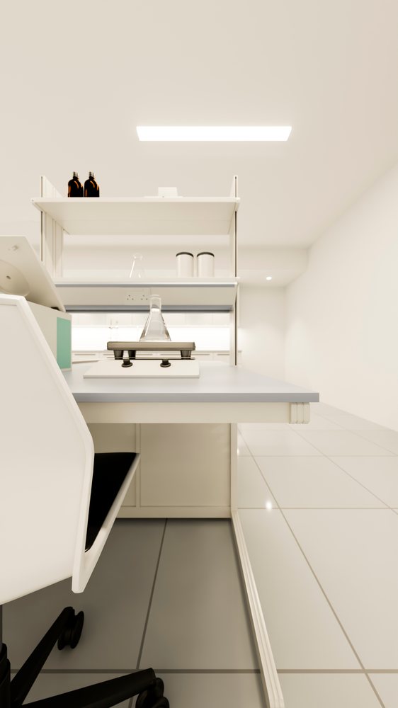 Laboratory desk with scientific equipment in clean white room