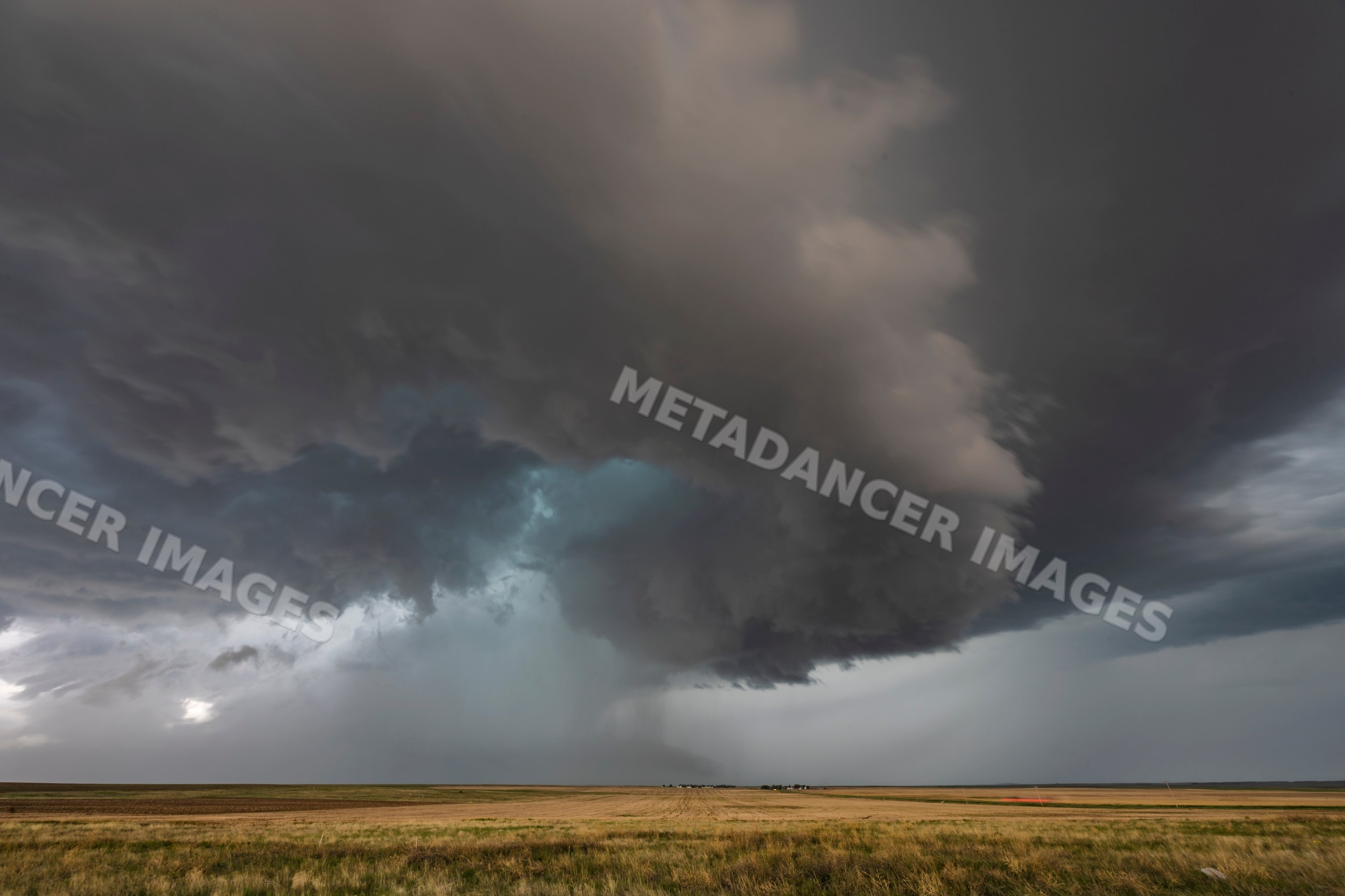 Tornado-warned Supercell storm over colorado grasslands