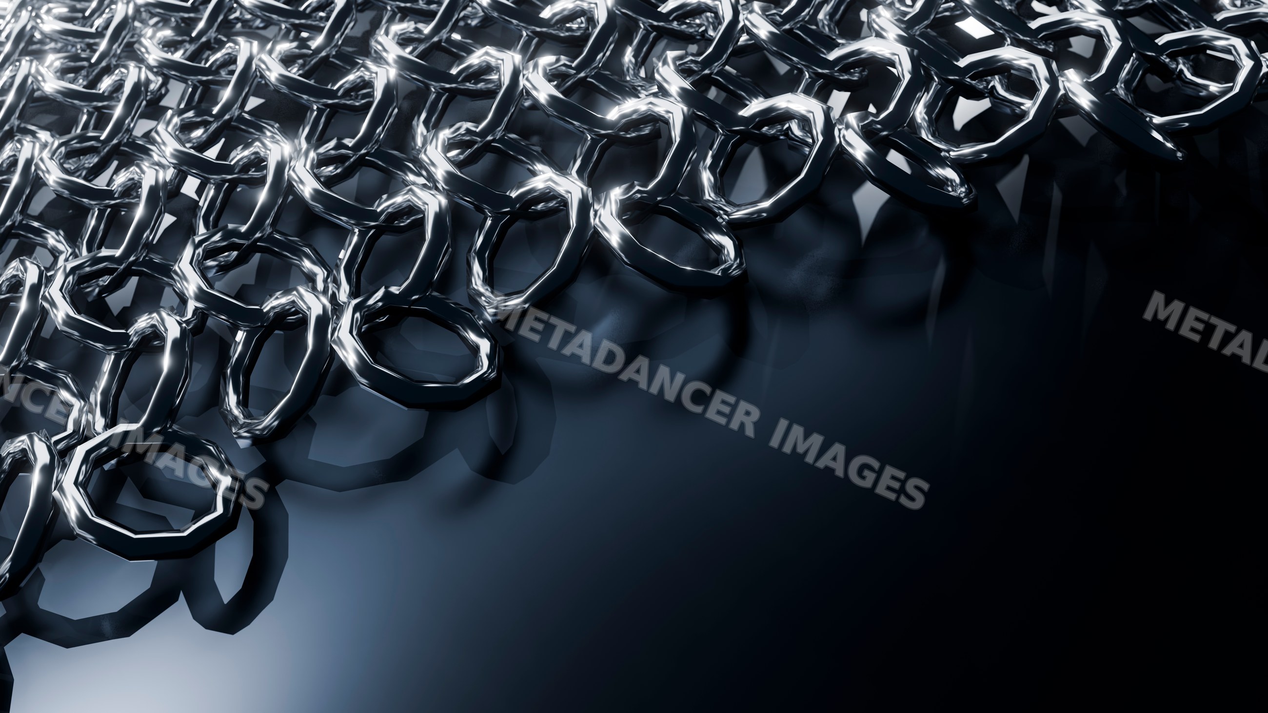 Interlocking metal chainmail rings forming protective armor surface
