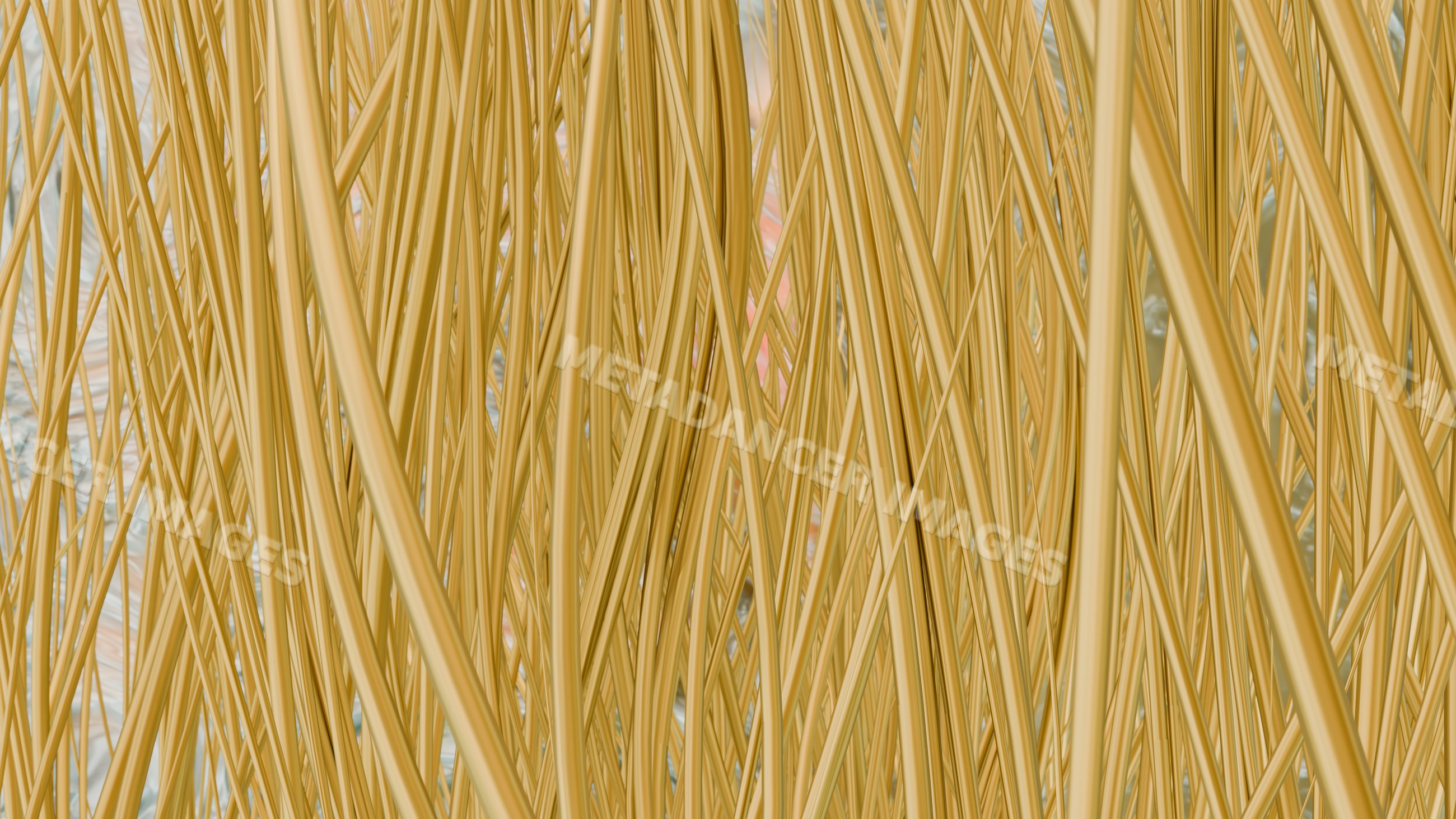 Yellow uncooked spaghetti pasta strands close-up view