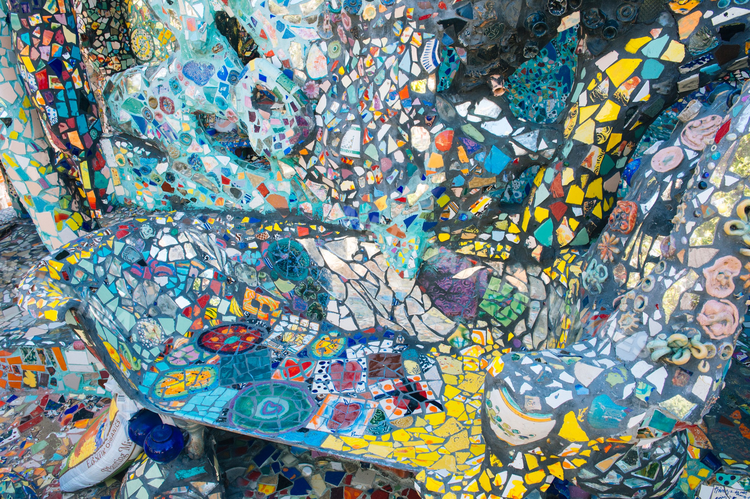 Colorful mosaic ceramic tile bench and art installation