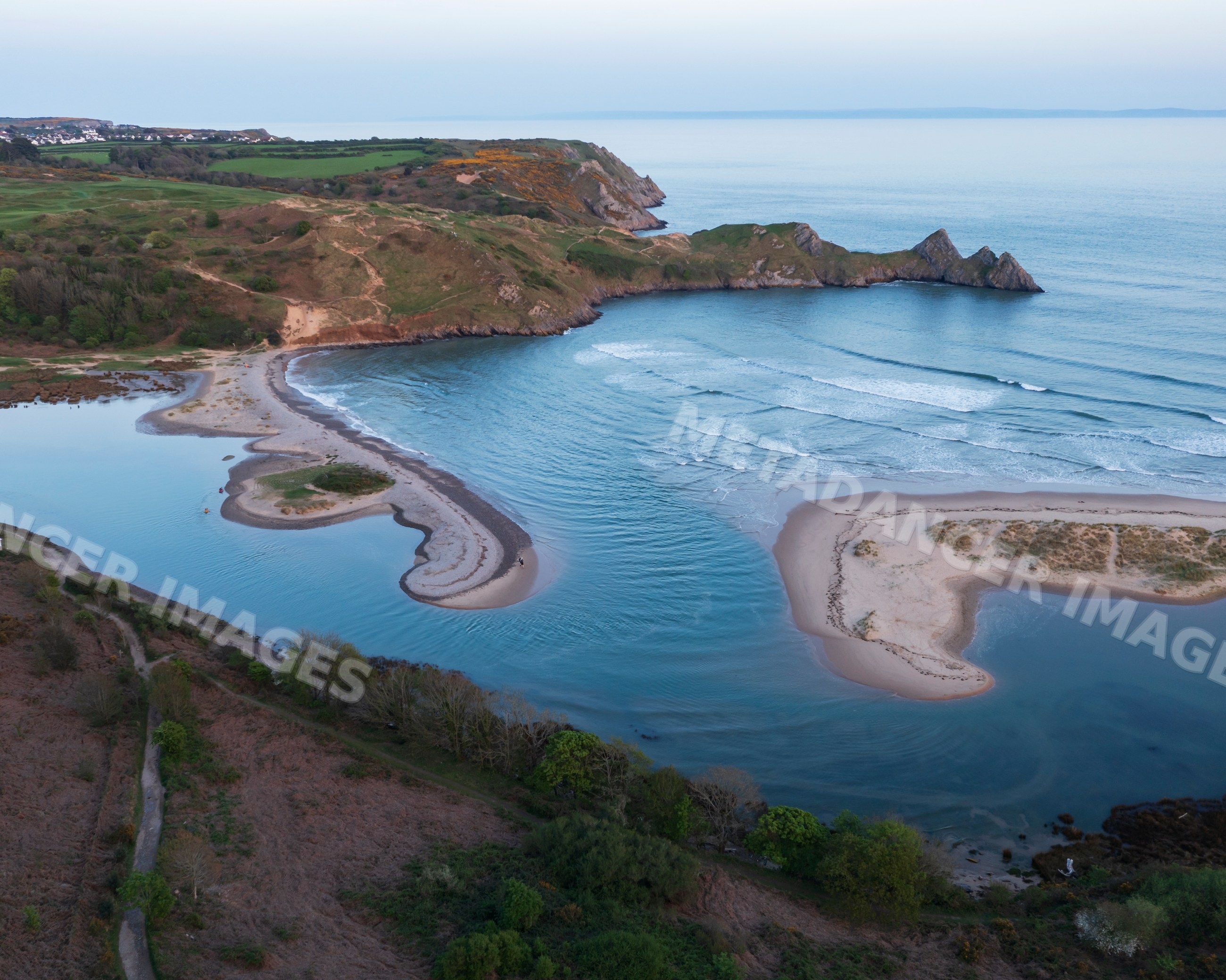 Aerial view of three Cliffs Bay on the gower peninsula