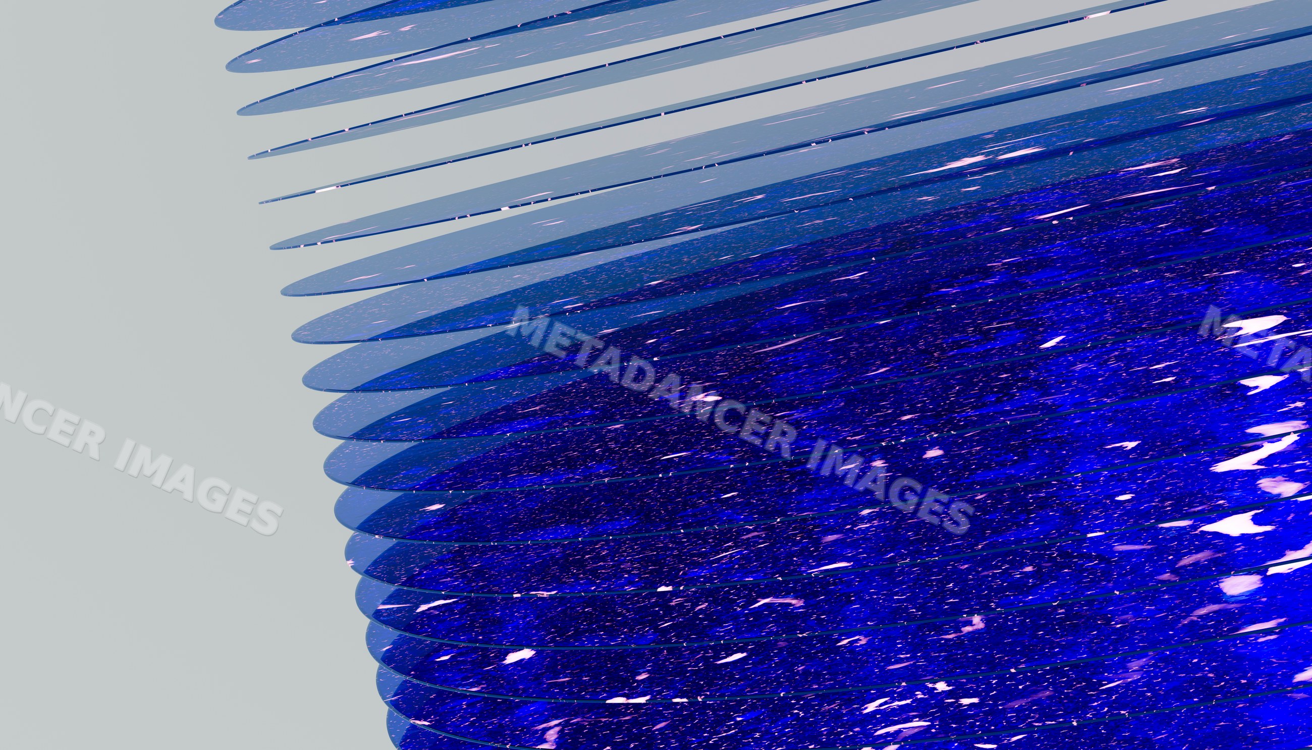 Blue glass sculpture with layered curved panels in studio environment