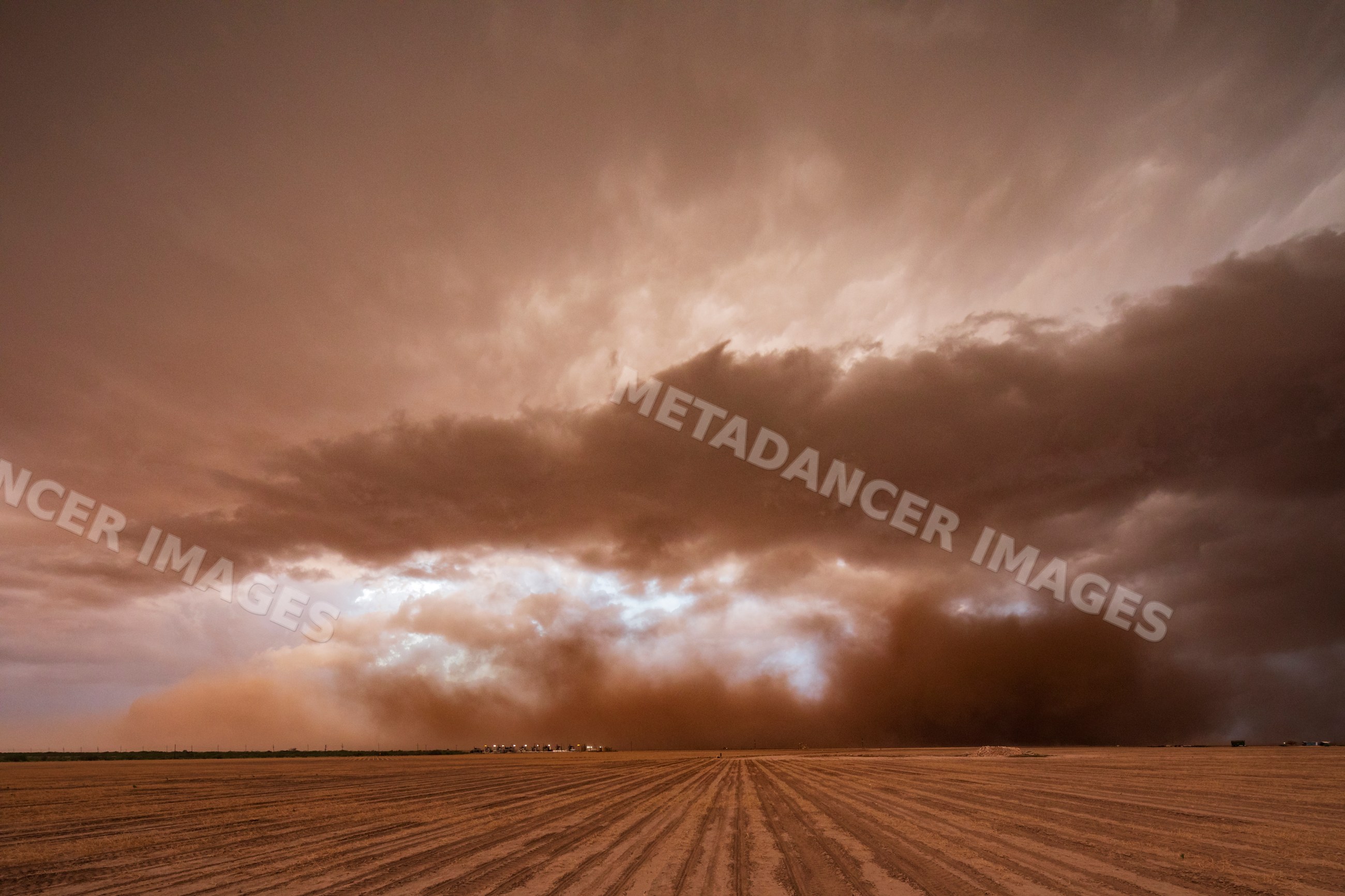 Dust Storm approaching severe supercell over dry field