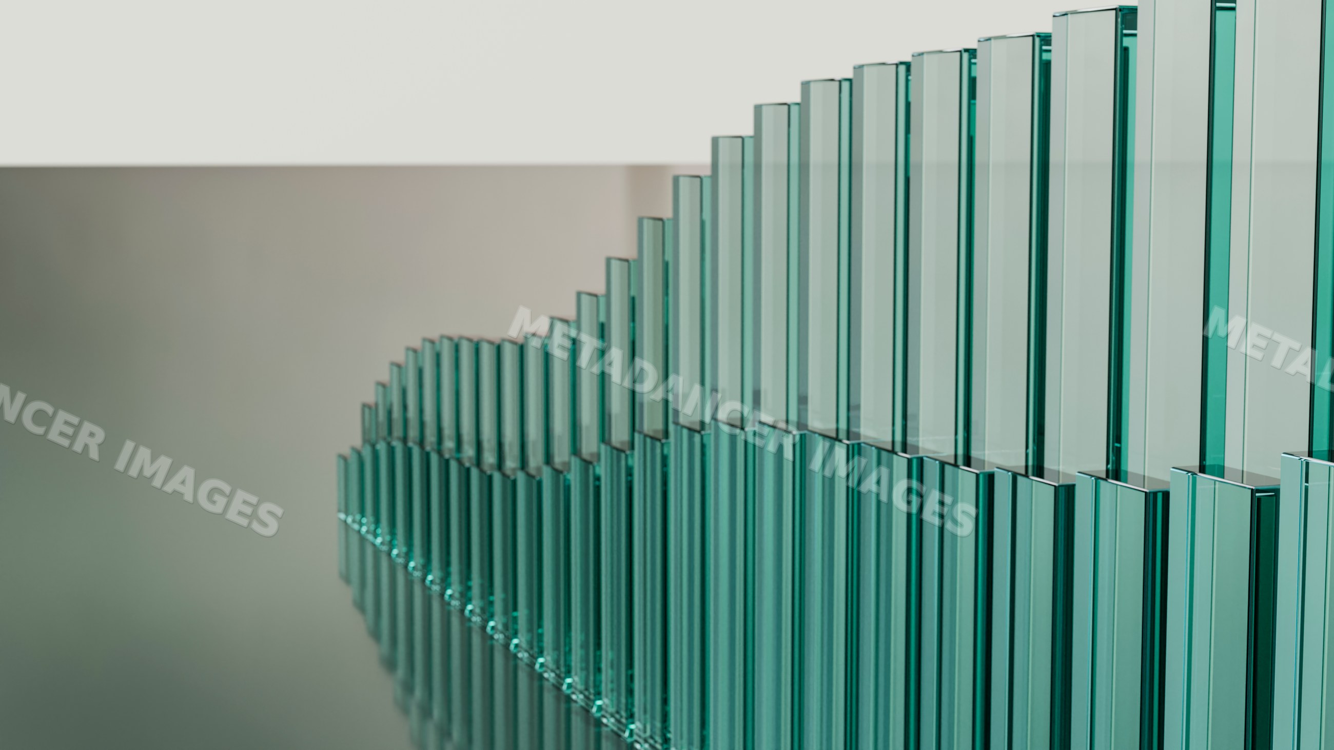 Row of teal-tinted glass panels in modern architecture