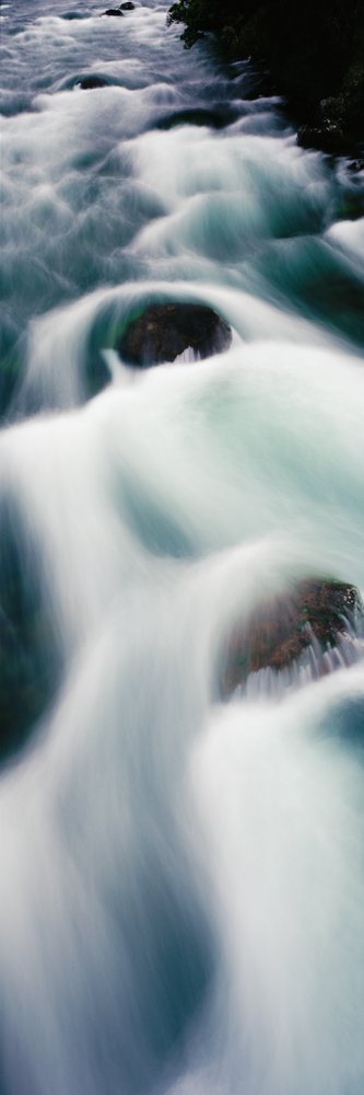 Buller river flowing over rocks in motion with long exposure