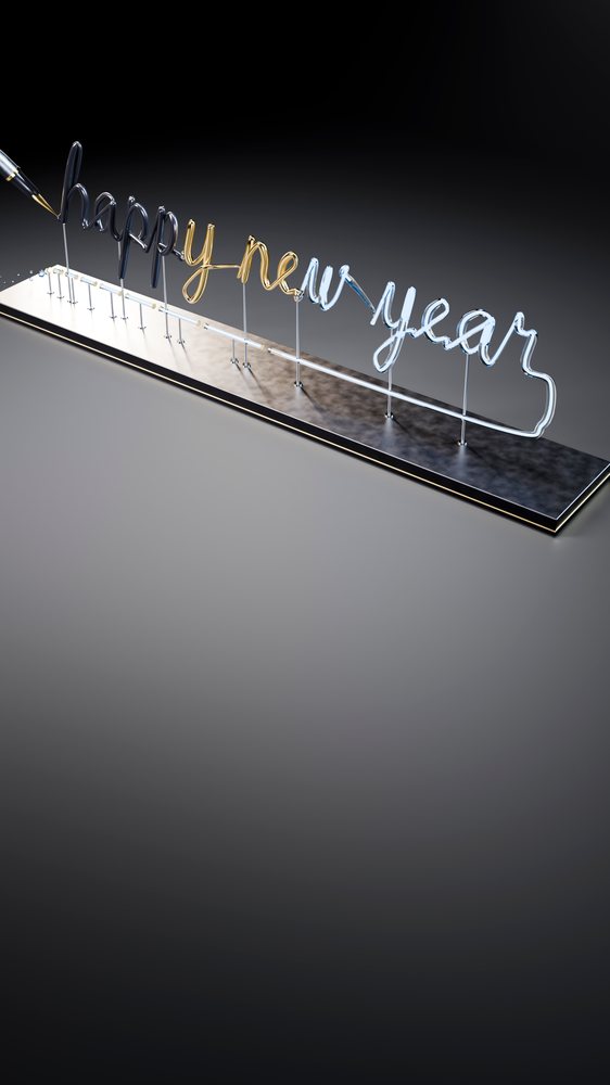 Neon happy new year sign with gold and silver lettering