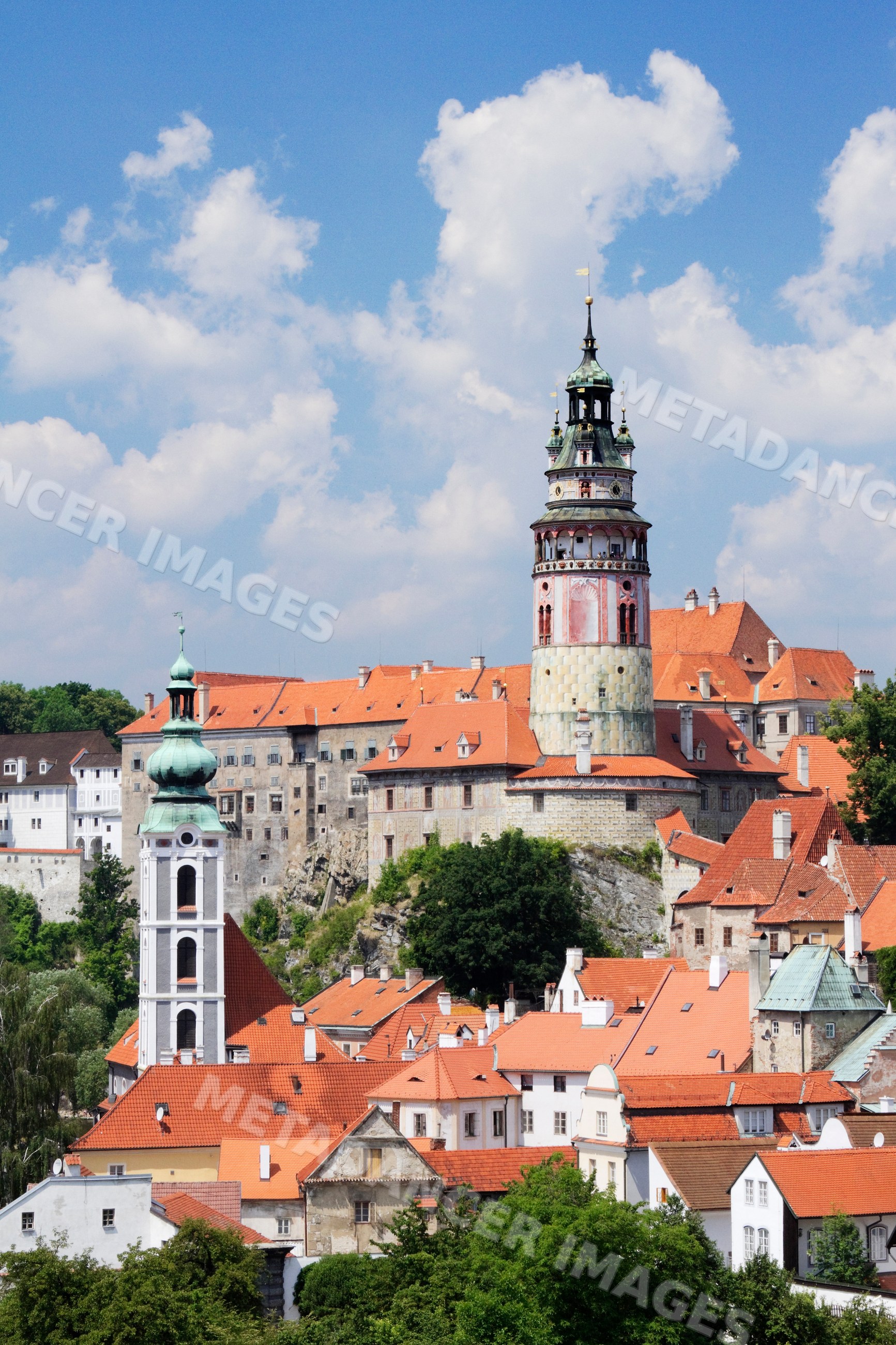 Cesky krumlov castle with towers and red roofs