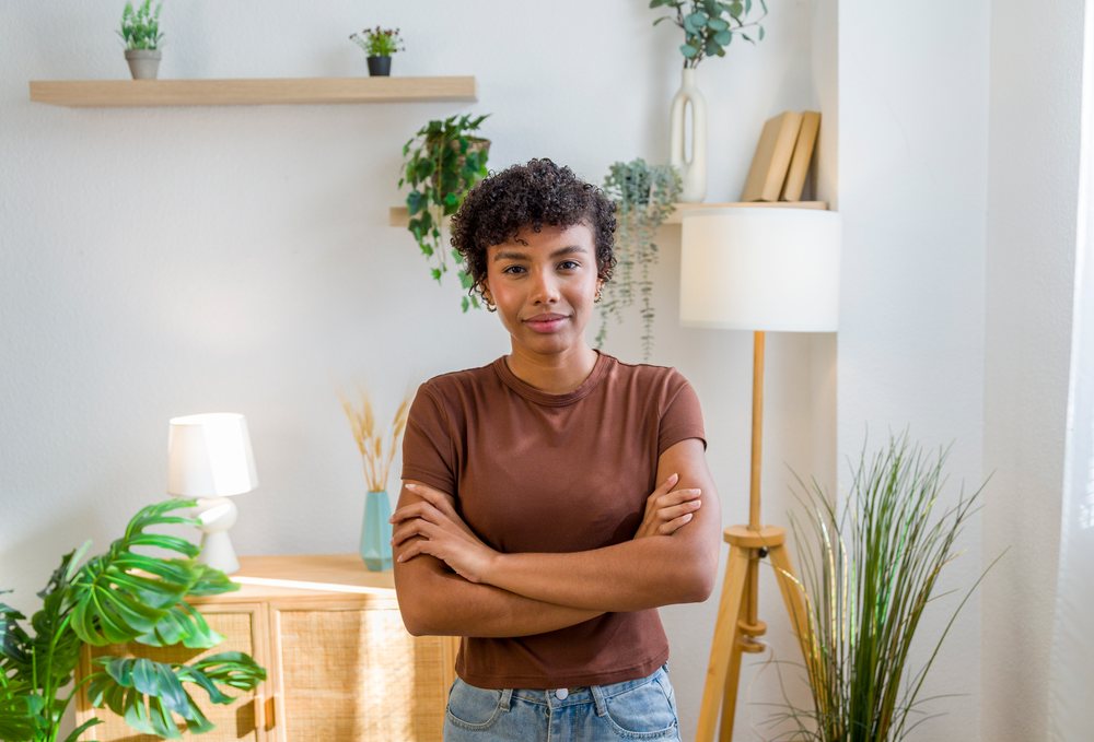 Young African American woman standing confidently