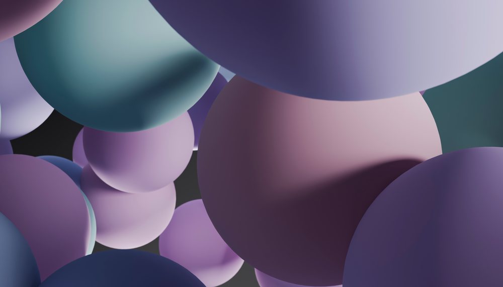 Abstract 3d rendering of colorful floating spheres with soft lighting