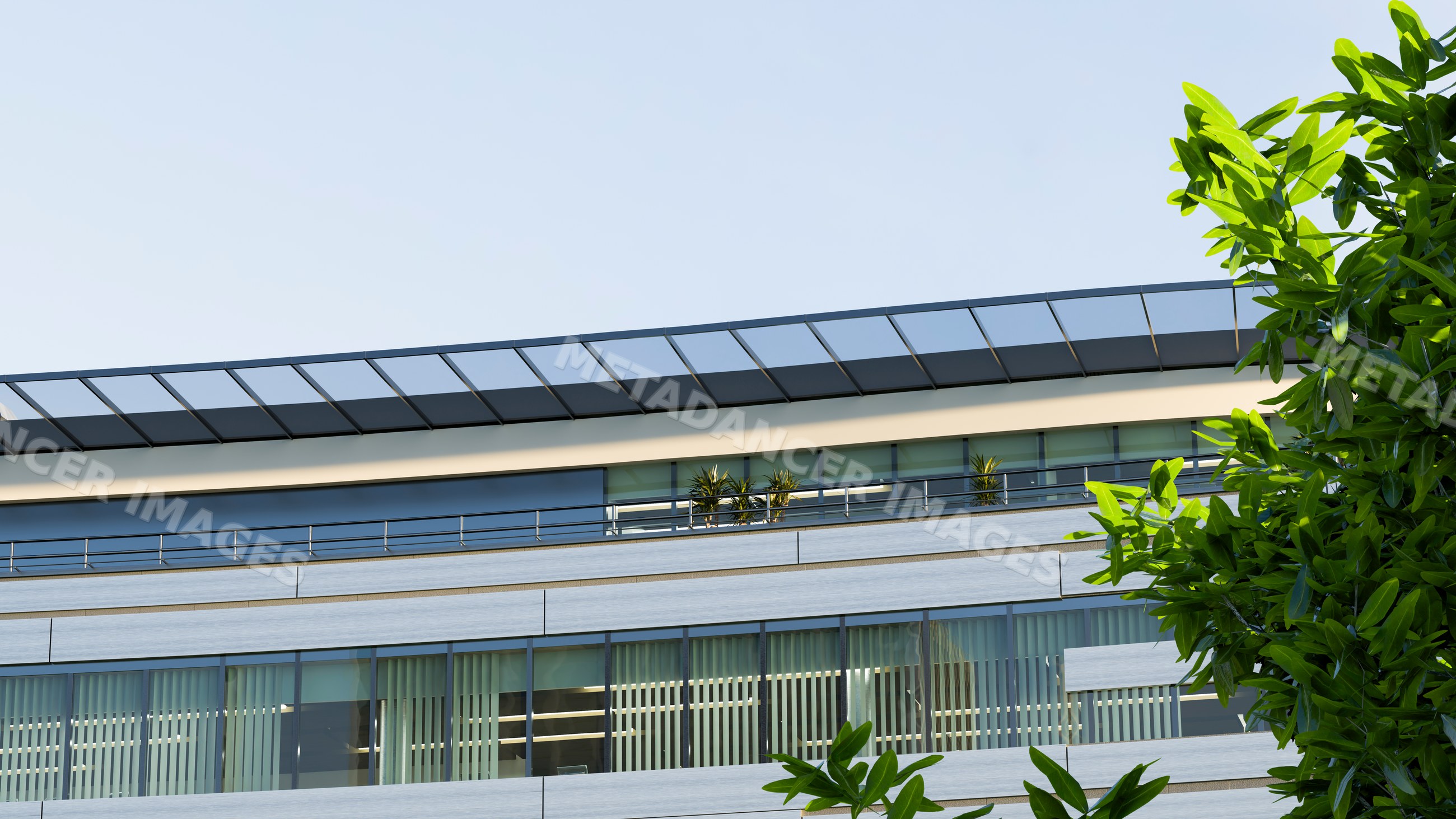 Modern office building with glass balcony and potted plants