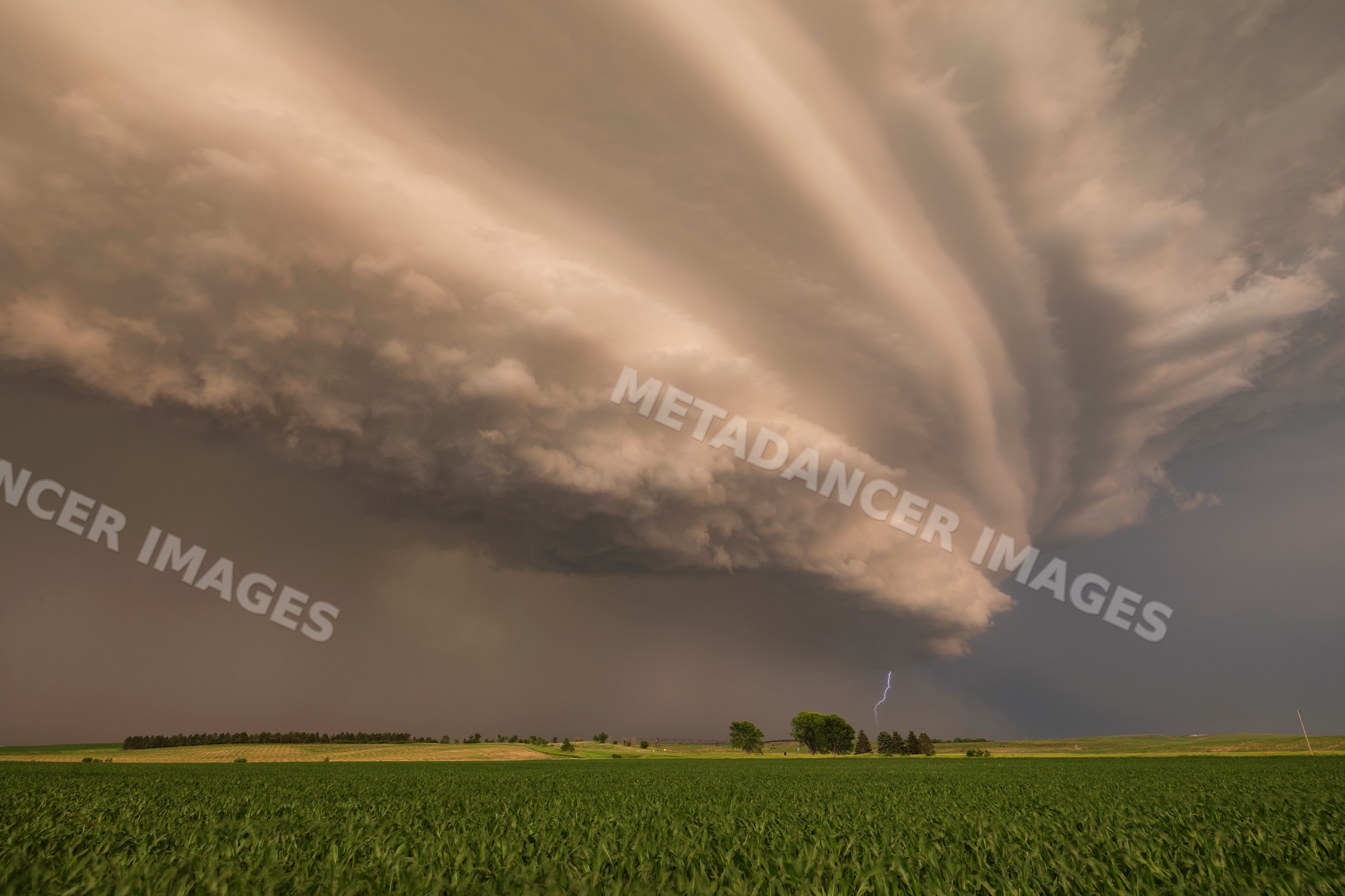 Supercell storm with tornado warning and lightning strike