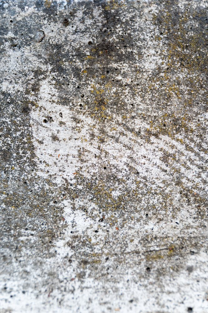 Weathered rough concrete texture with white marks