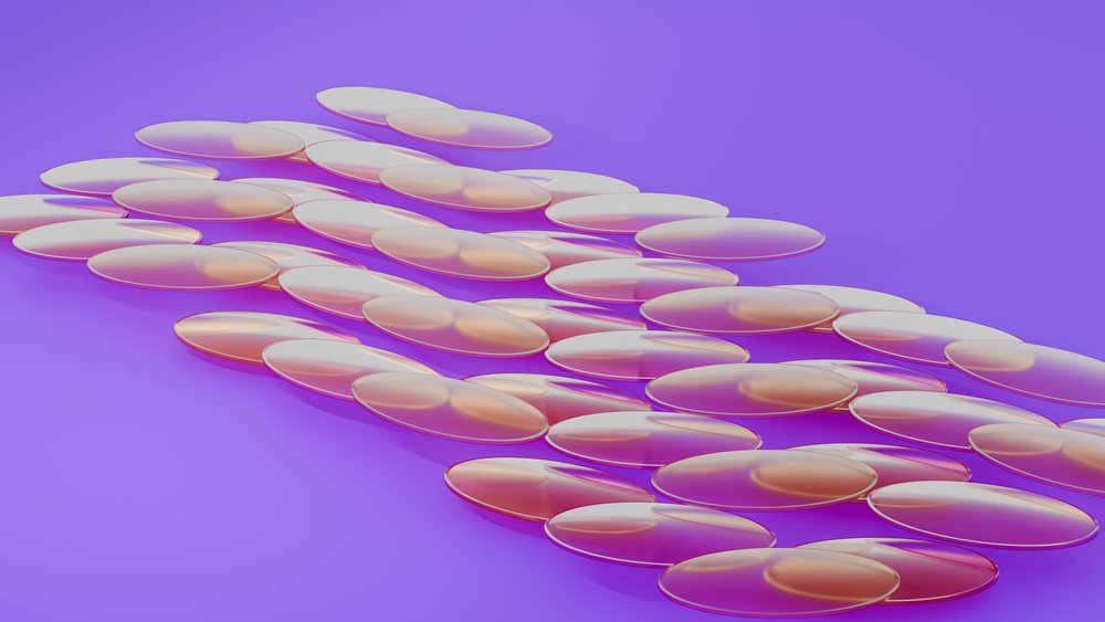 Transparent medical capsules scattered in a 3d illustration