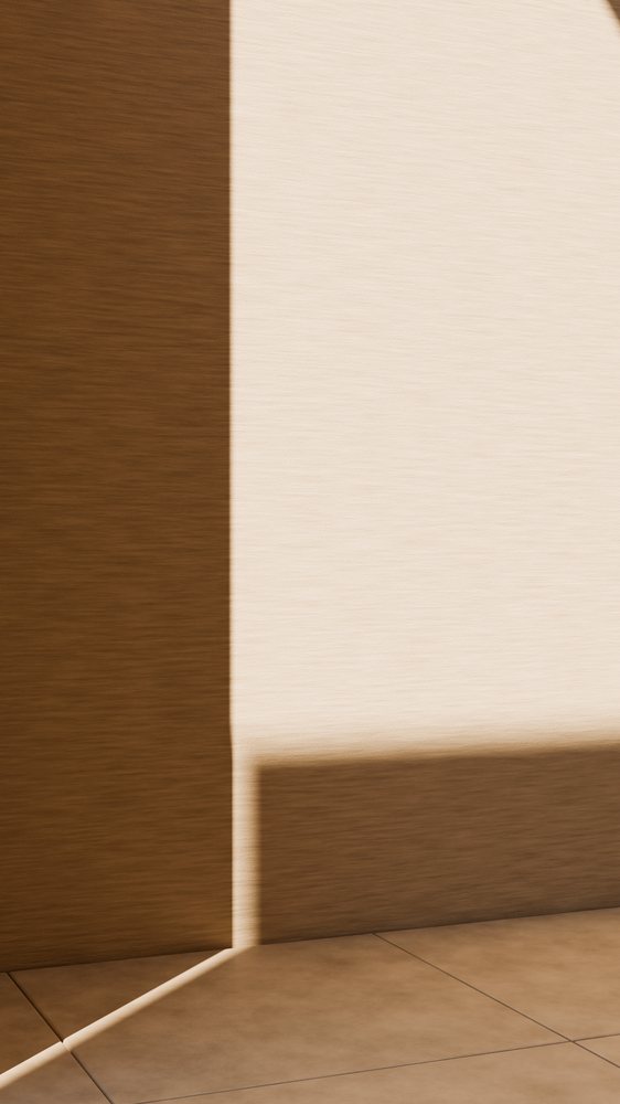 Sunlight casting geometric shadows on textured beige and brown wall