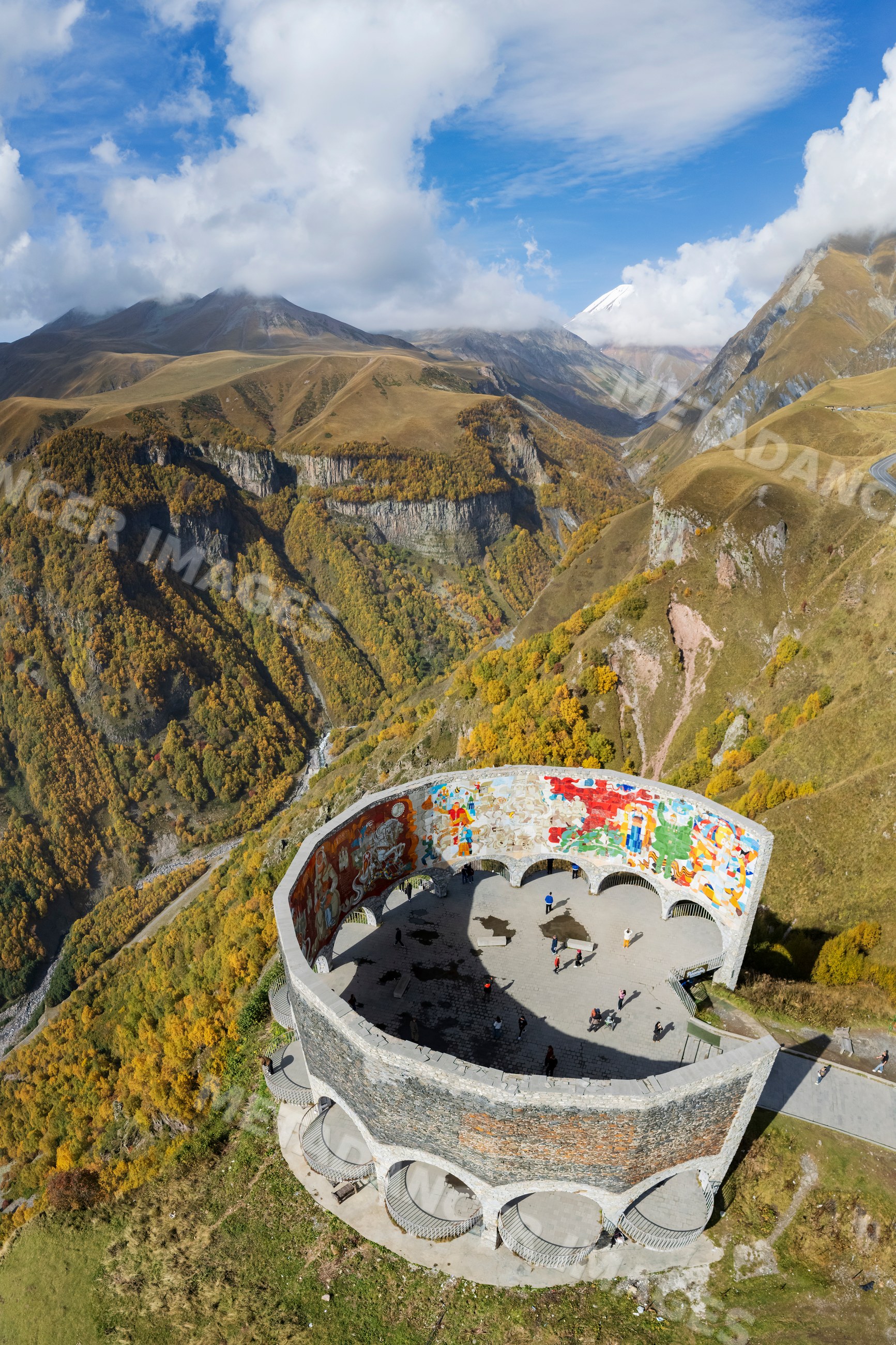 Russia-Georgia friendship monument and Autumn mountain scenery