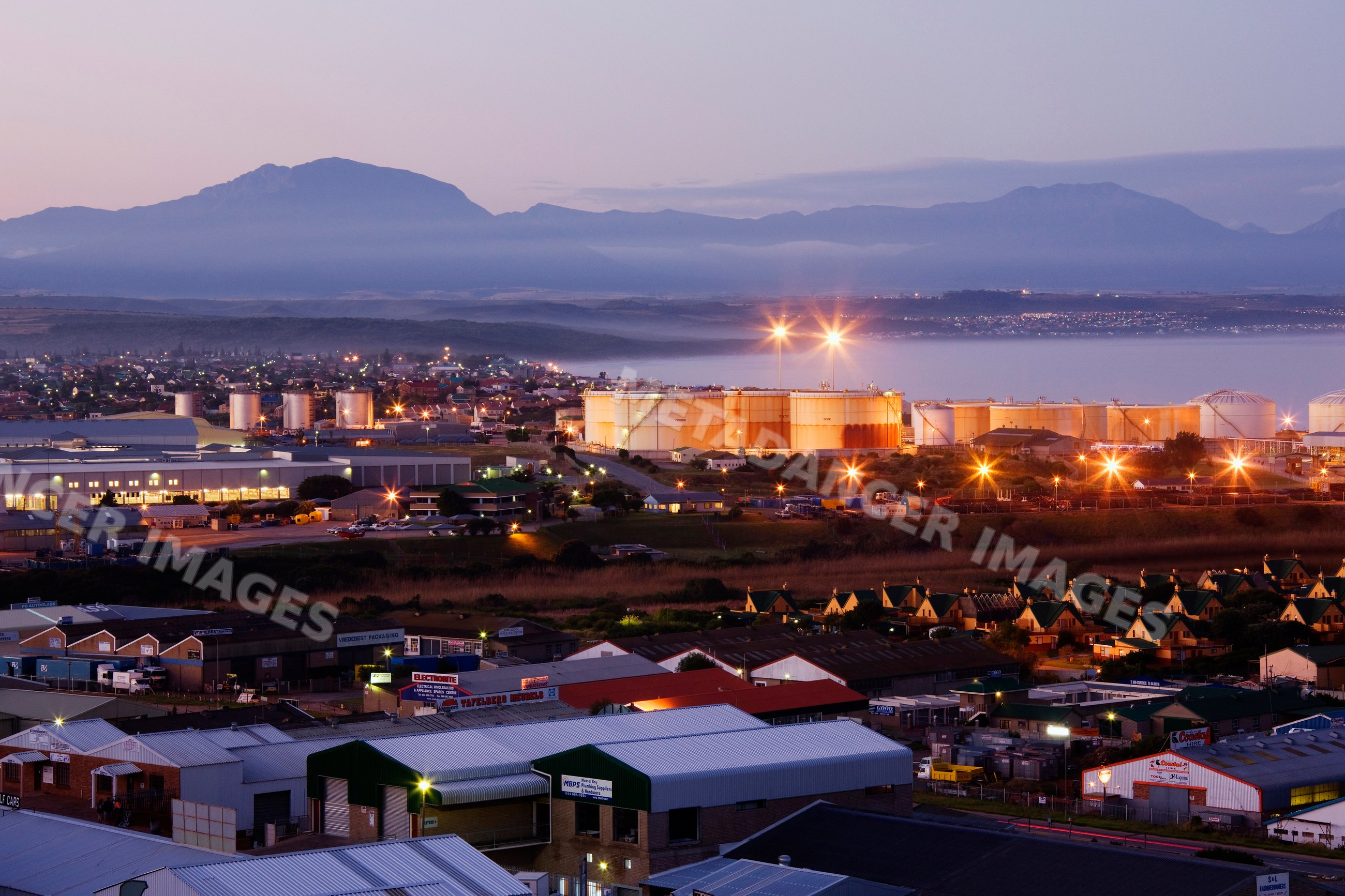 Mossel bay skyline with industrial tanks, south africa
