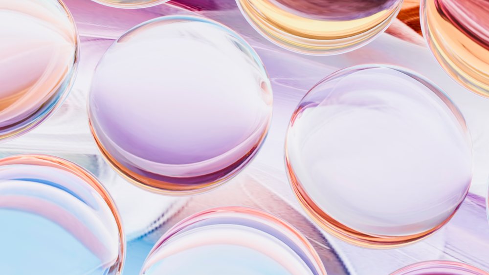 Transparent spheres with colorful light reflections abstract