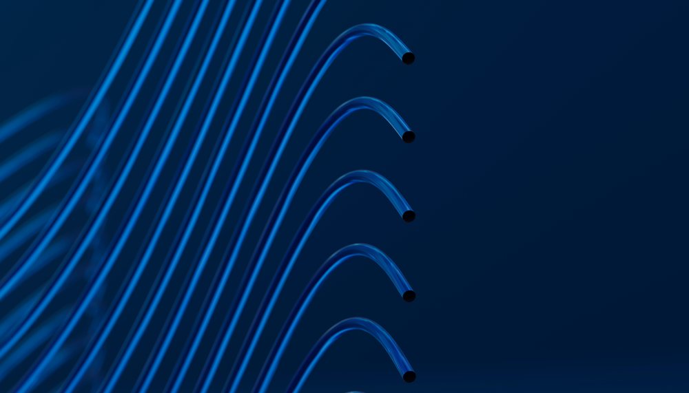 Blue flexible curved tubes in abstract dark background