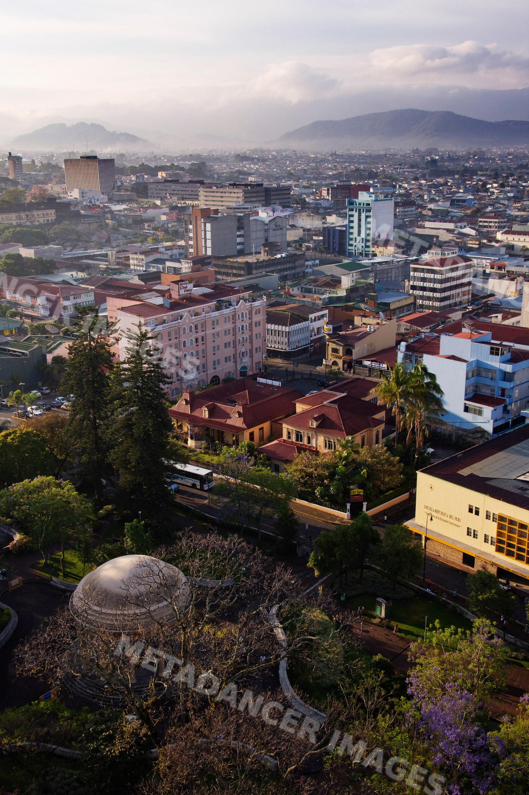 Cityscape of san jose, costa rica with park and mountains
